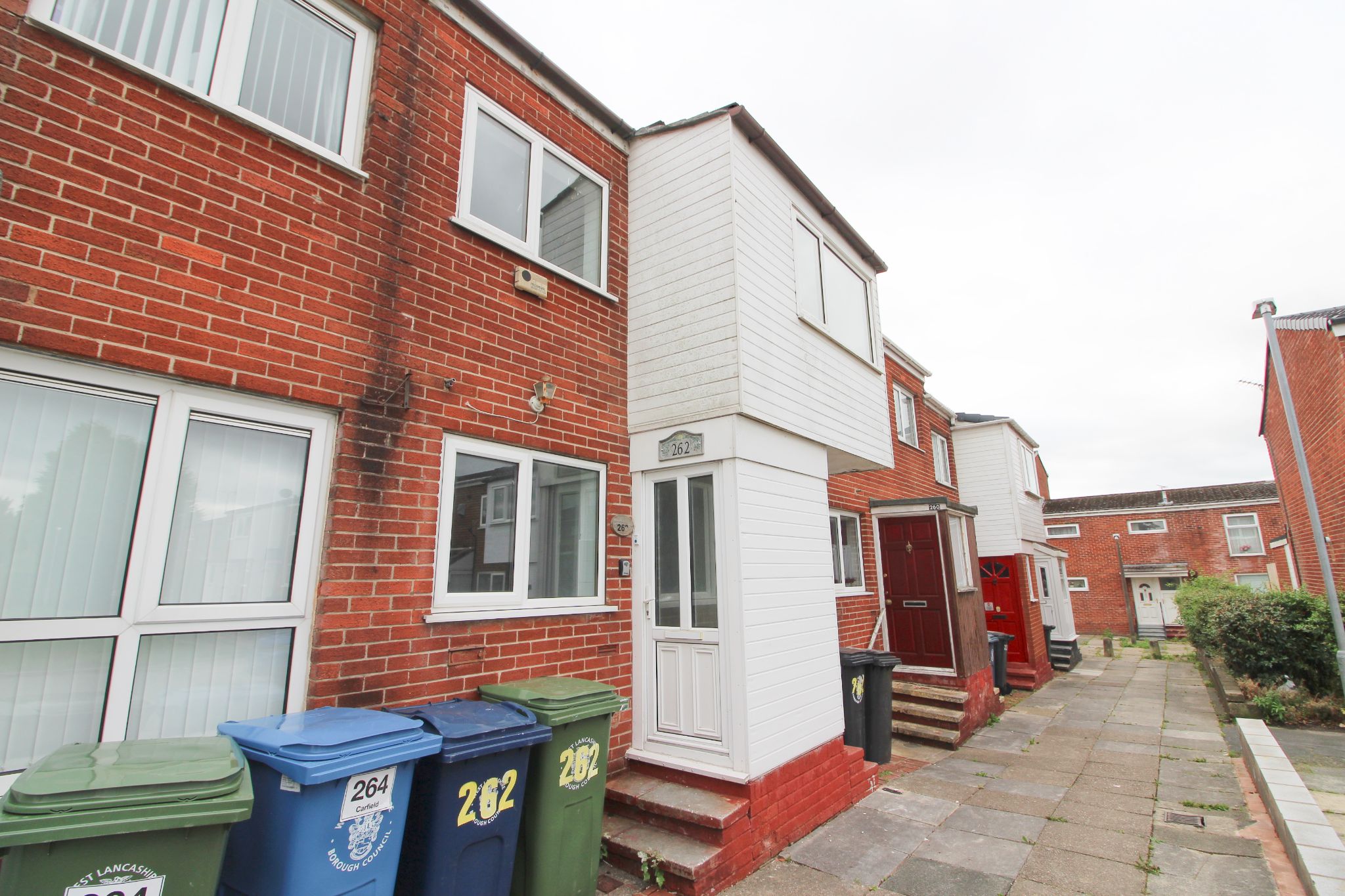 3 bedroom mid terraced house To Let in Skelmersdale - Photograph 1.
