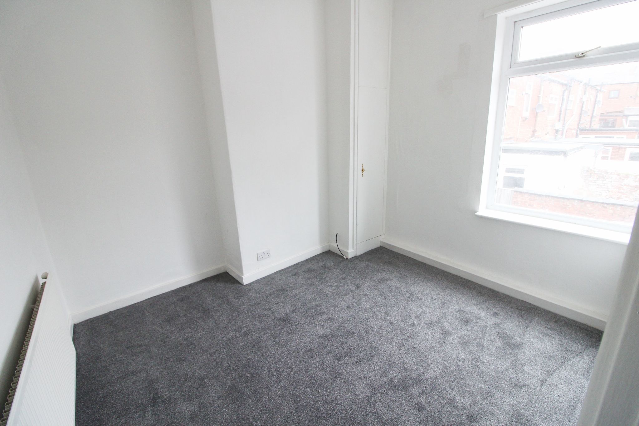 3 bedroom mid terraced house To Let in Wigan - Photograph 7.