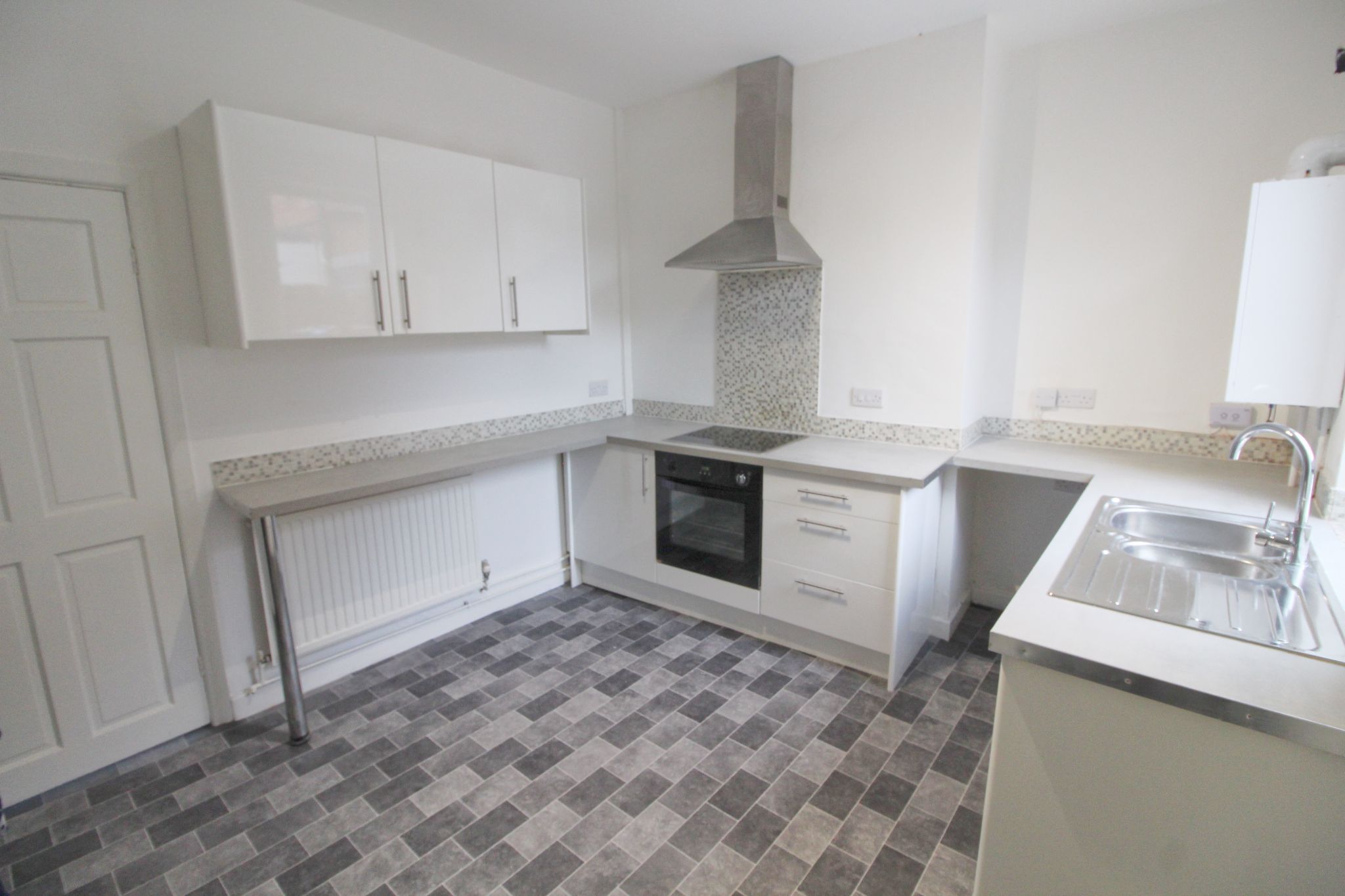 3 bedroom mid terraced house To Let in Wigan - Photograph 4.