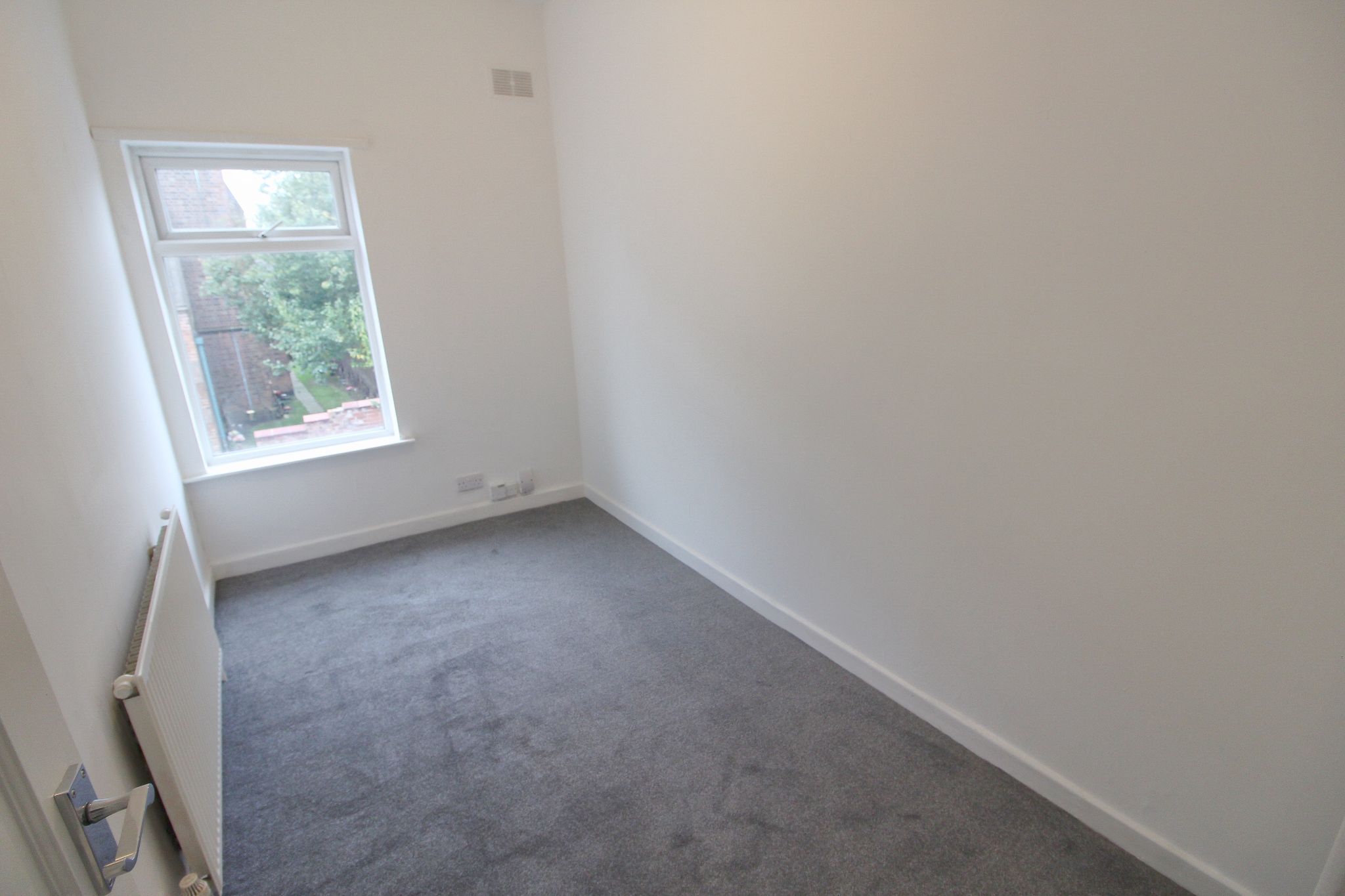 3 bedroom mid terraced house To Let in Wigan - Photograph 5.