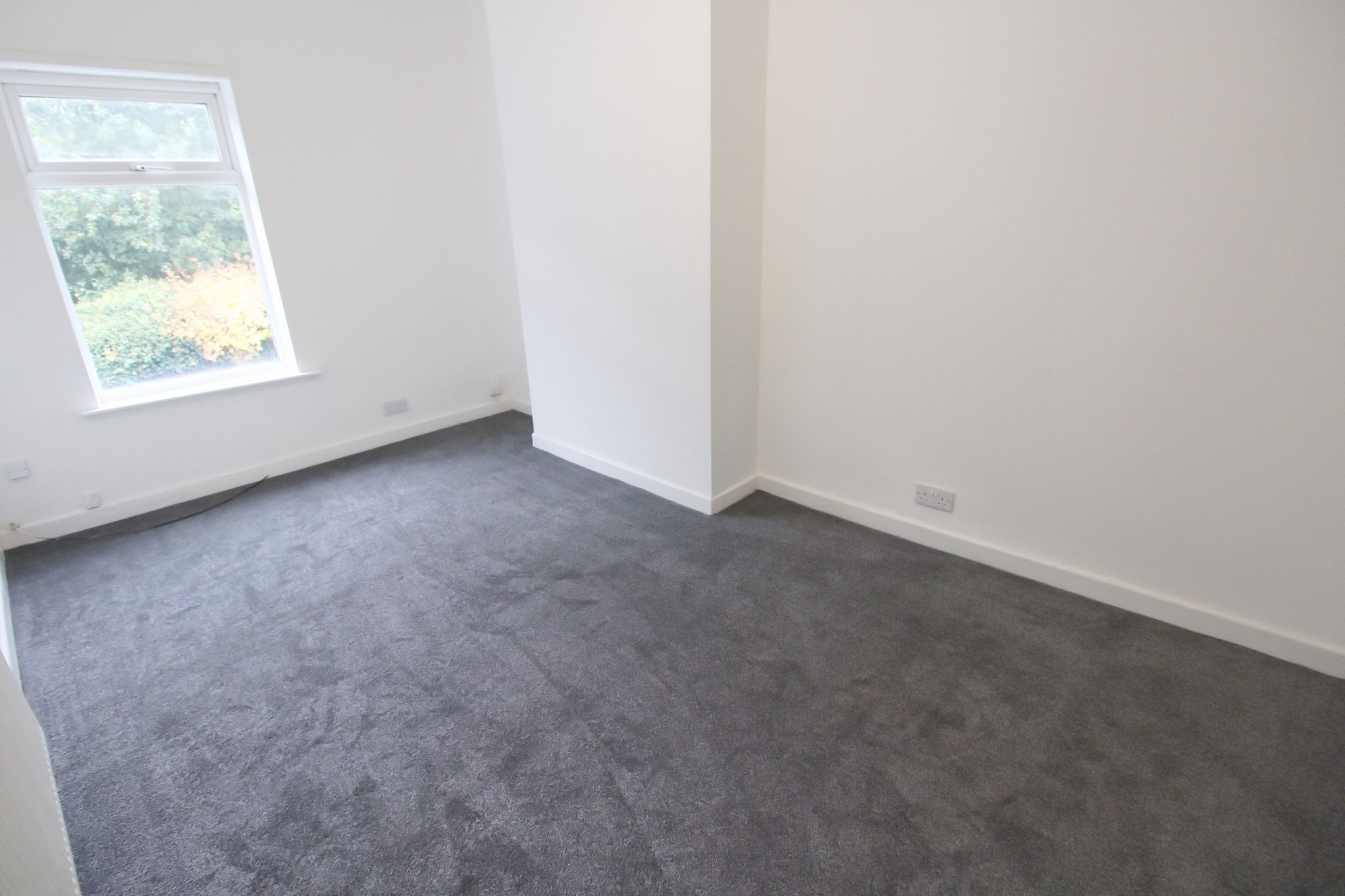 3 bedroom mid terraced house To Let in Wigan - Photograph 6.