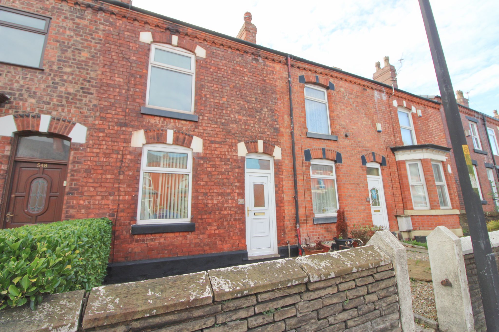 2 bedroom mid terraced house To Let in Wigan - Photograph 2.