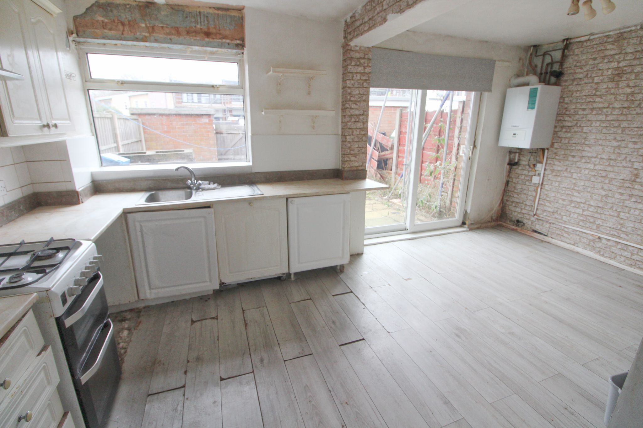 3 bedroom mid terraced house For Sale in Wigan - Photograph 6.
