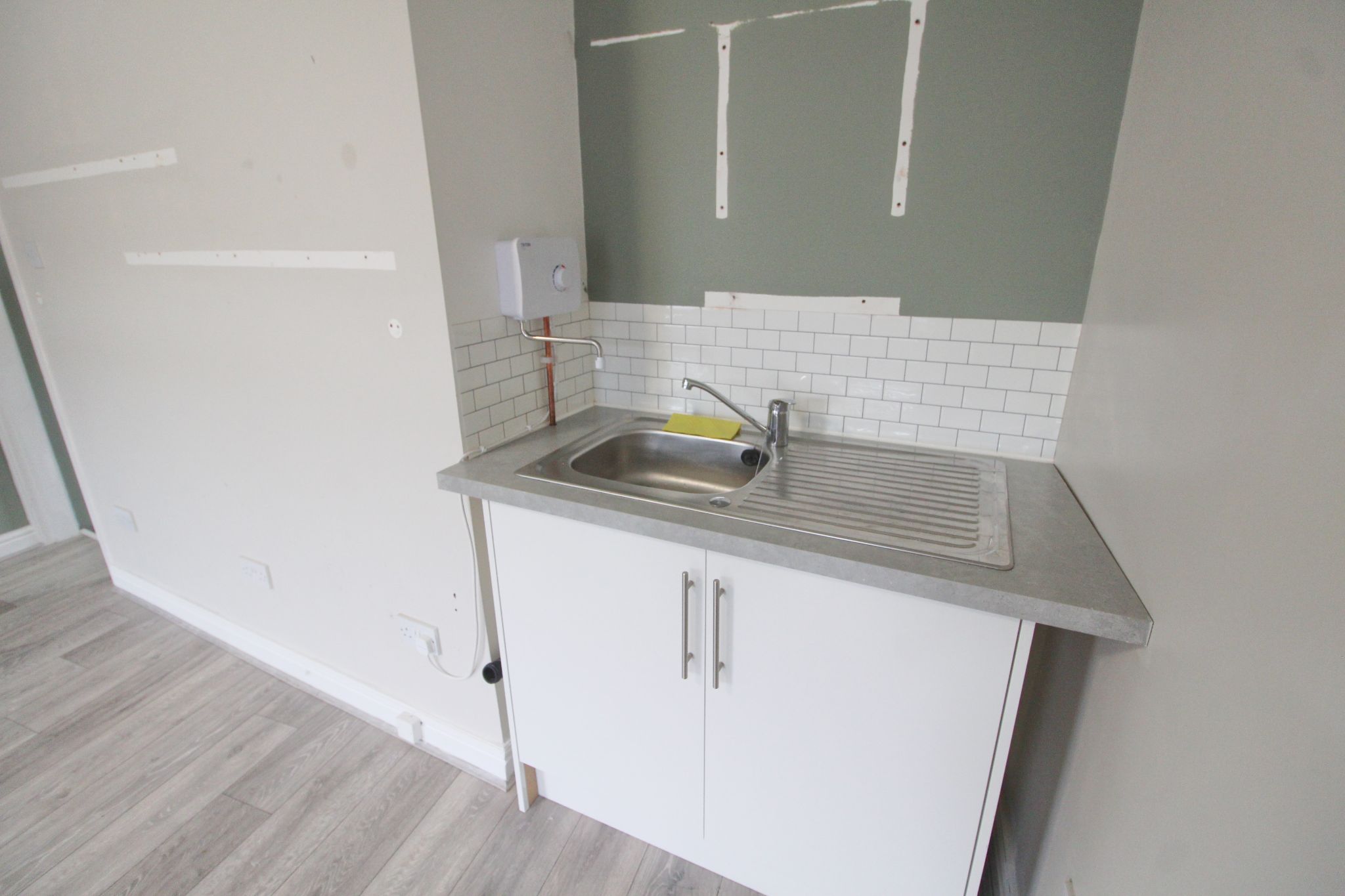 Empty Retail Premises To Let in Wigan - Property photograph.