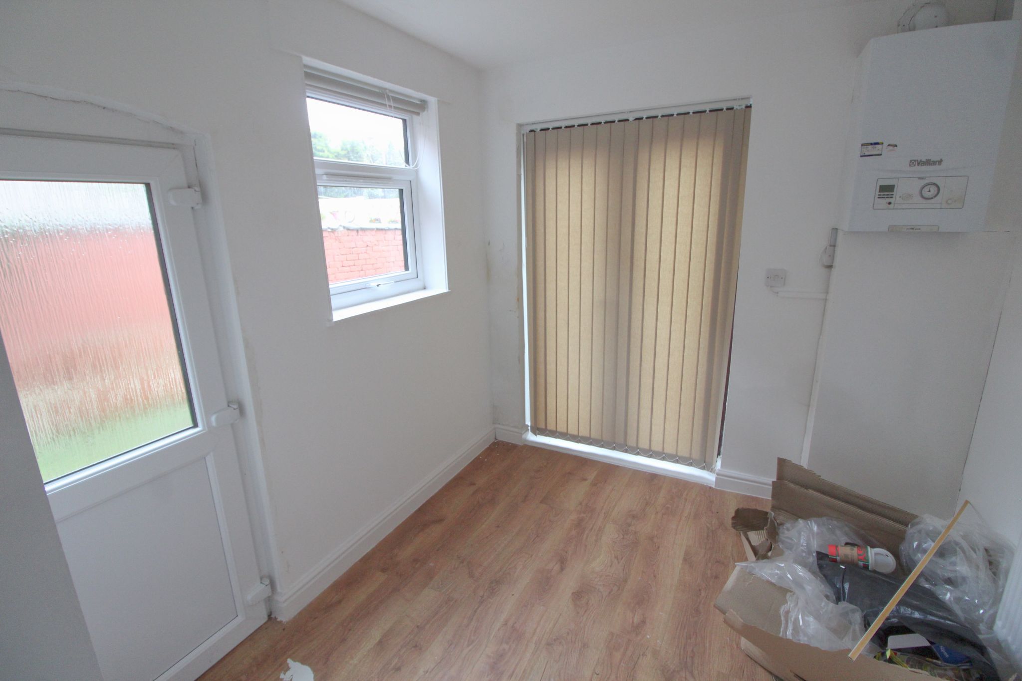 3 bedroom mid terraced house To Let in Wigan - Photograph 6.