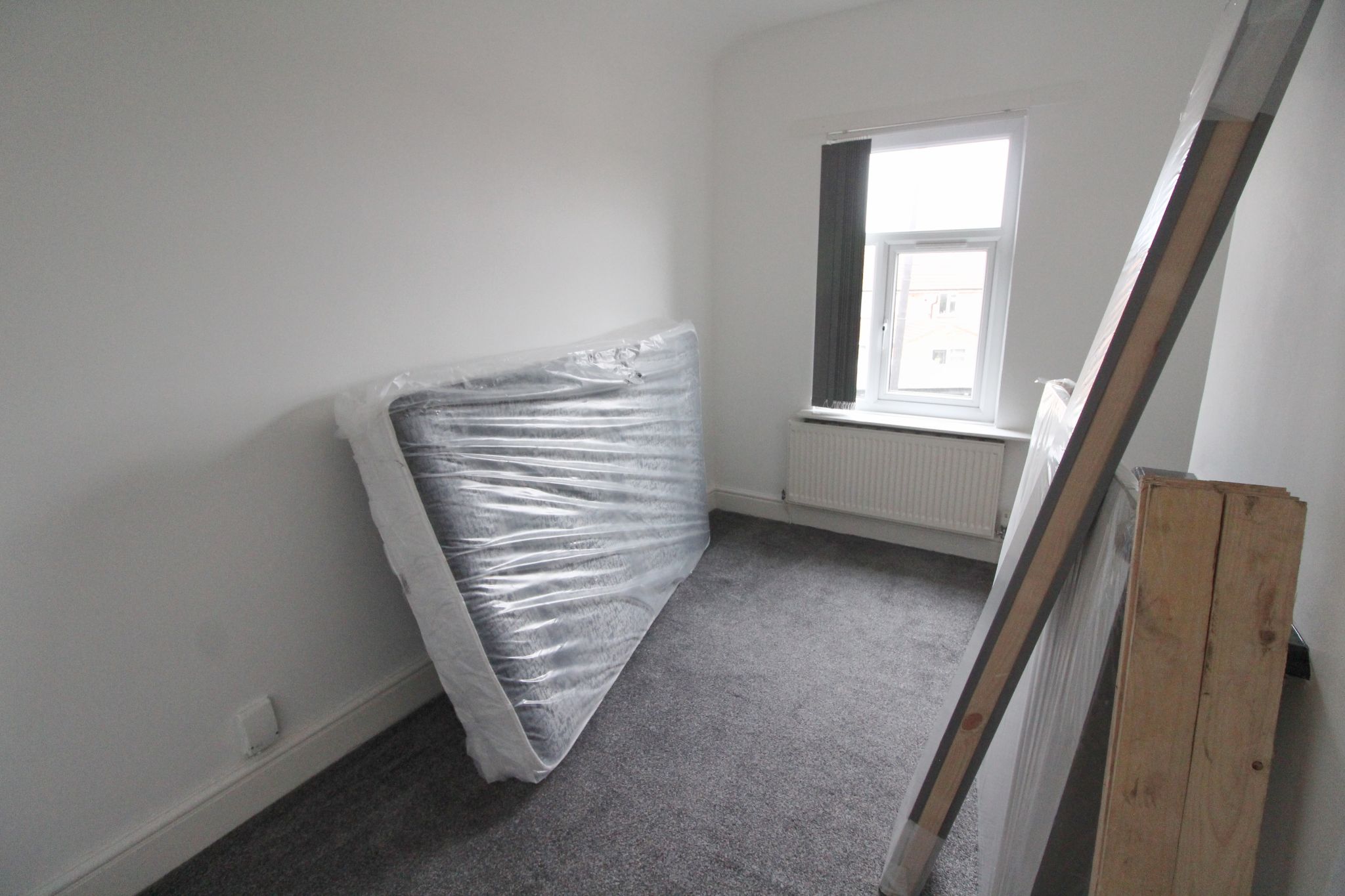 3 bedroom mid terraced house To Let in Wigan - Photograph 9.