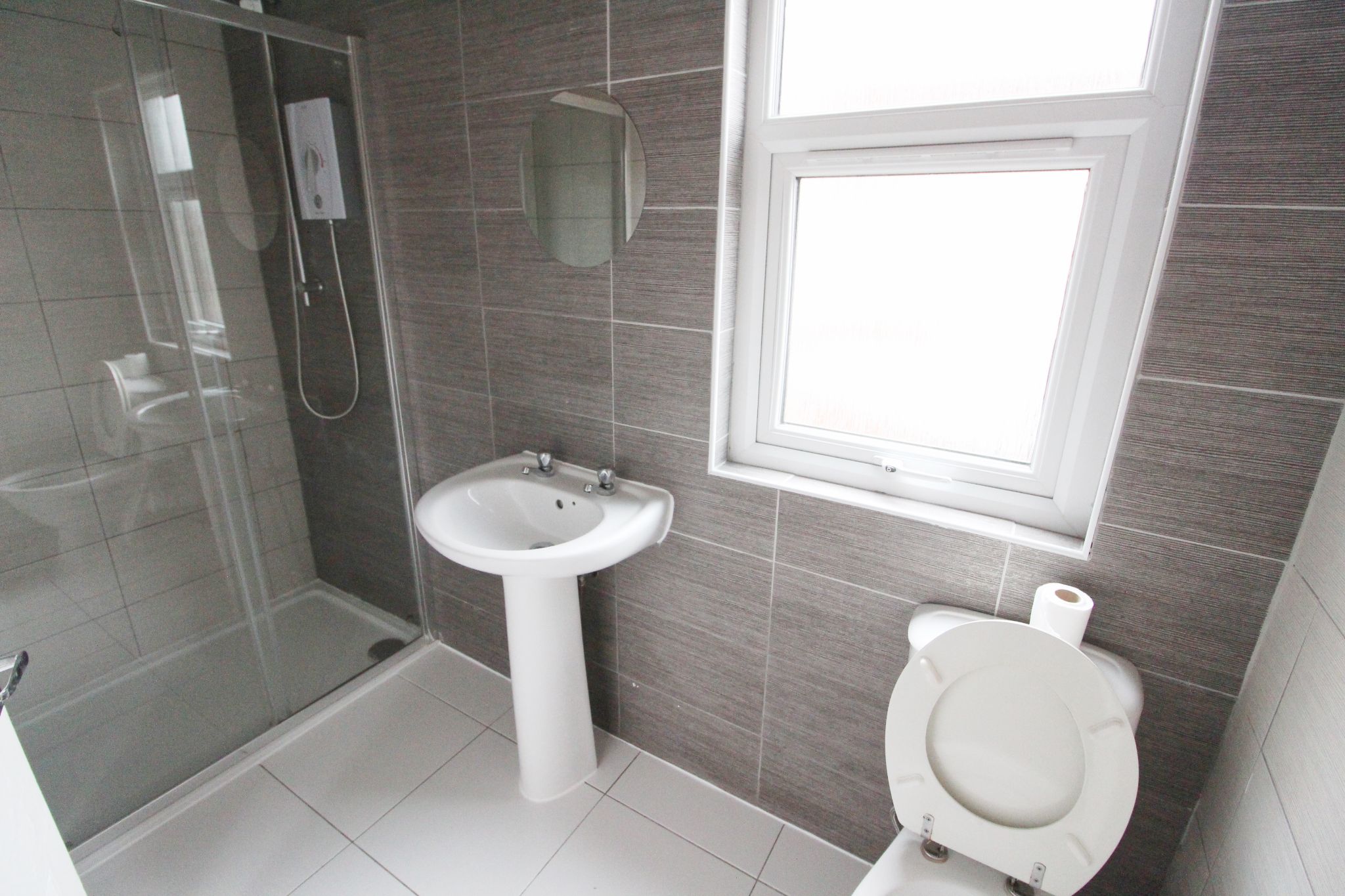 3 bedroom mid terraced house To Let in Wigan - Photograph 10.