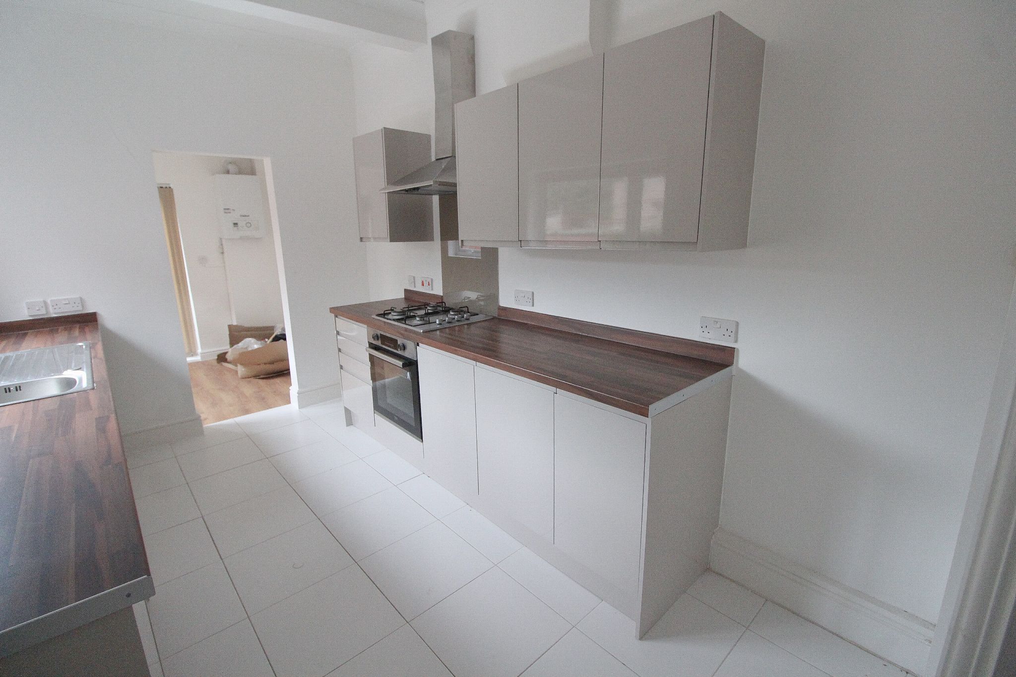 3 bedroom mid terraced house To Let in Wigan - Photograph 5.