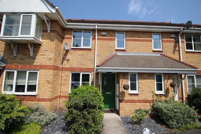 2 bedroom mid terraced house SSTC in Manchester - Photograph 1.