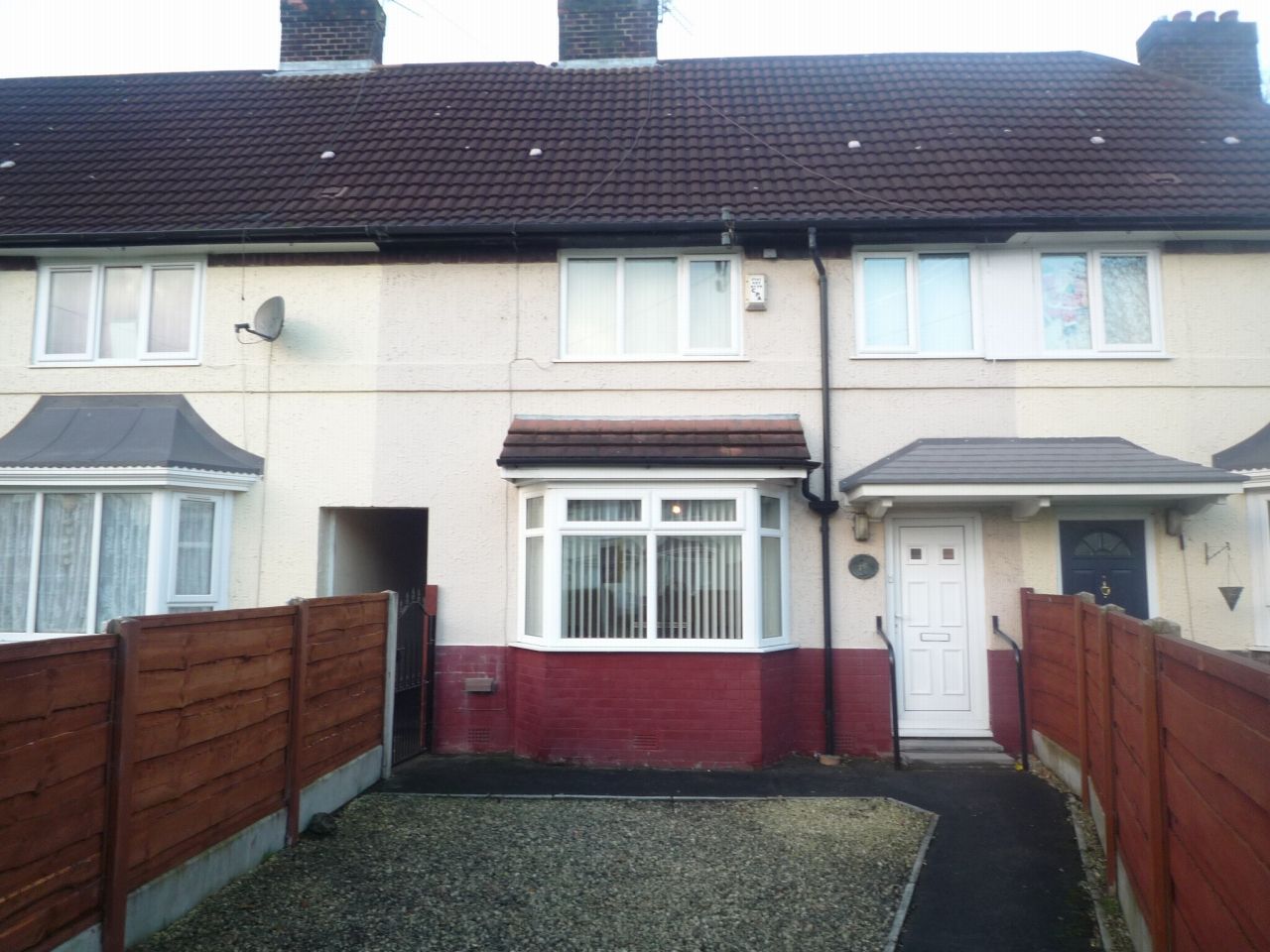 3 bedroom mid terraced house SSTC in Manchester - Photograph 1.