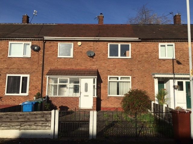 3 bedroom mid terraced house SSTC in Manchester - Photograph 1.