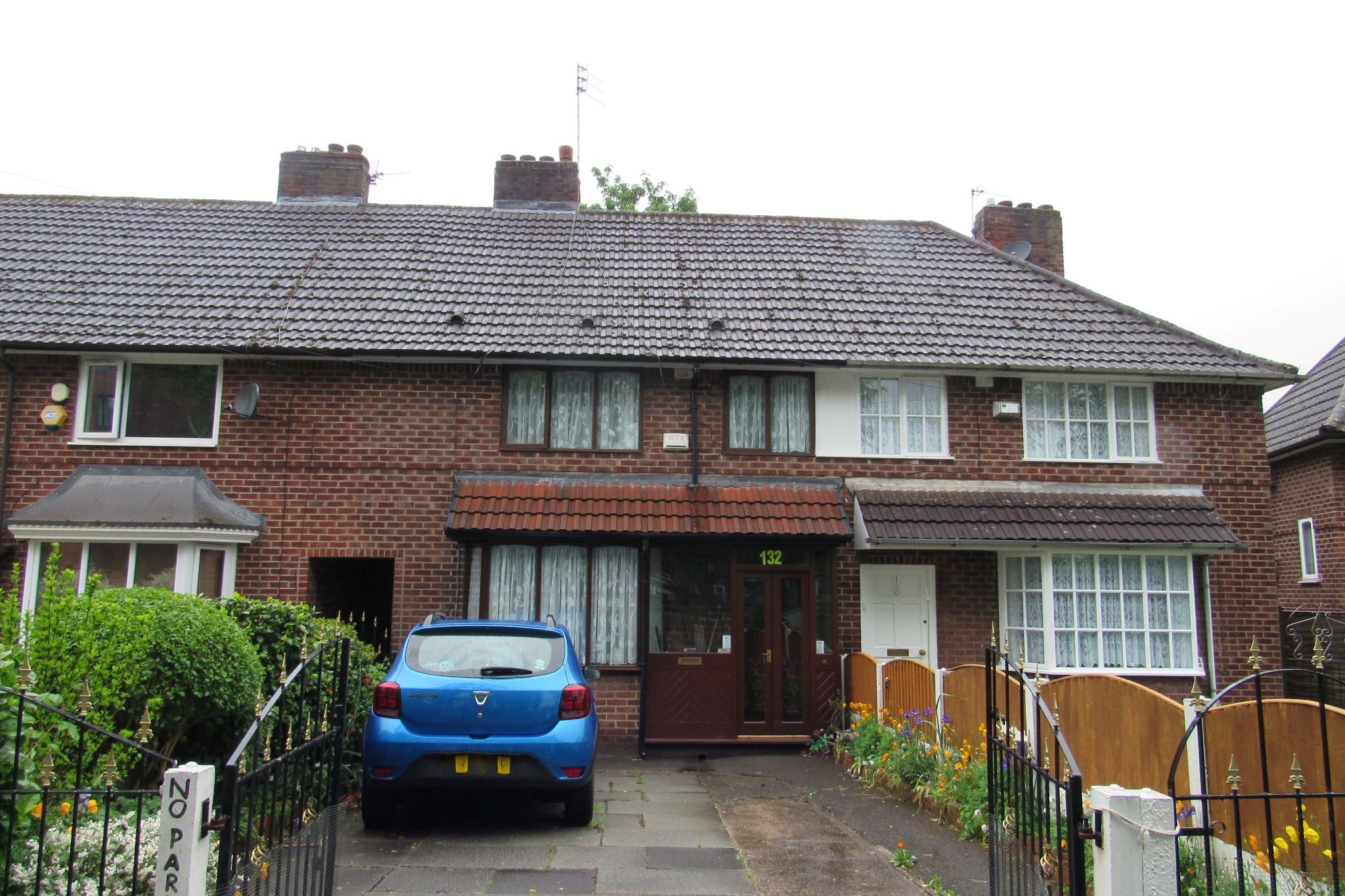 4 bedroom mid terraced house For Sale in Manchester - Photograph 1.