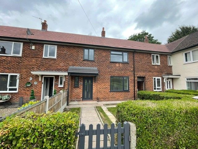 3 bedroom mid terraced house To Let in Manchester - Photograph 1.