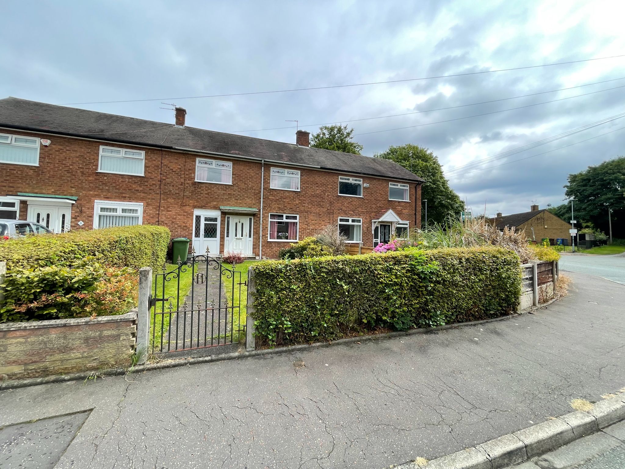 3 bedroom mid terraced house SSTC in Manchester - Photograph 1.