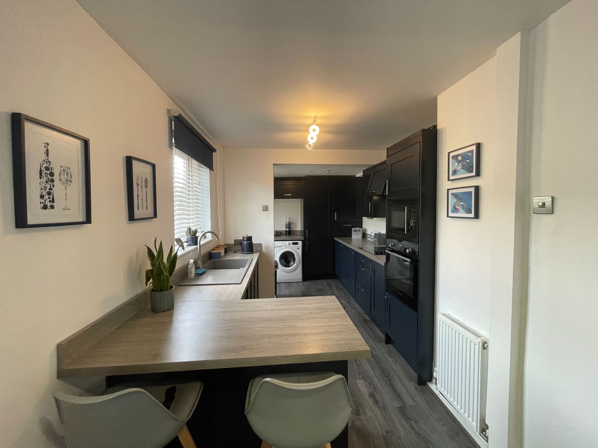 3 bedroom mid terraced house For Sale in Manchester - Photograph 5.