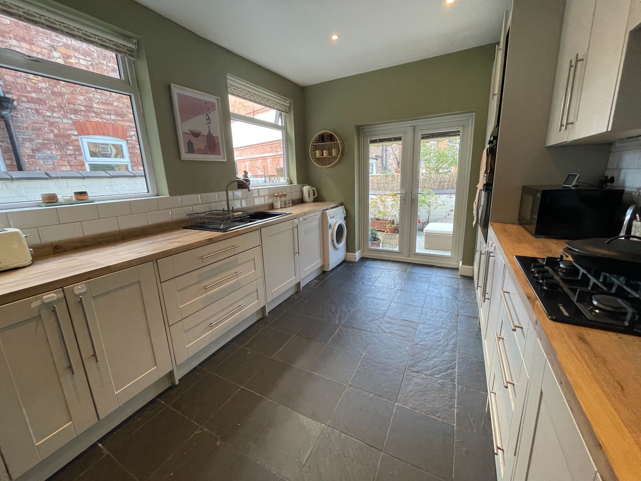 3 bedroom mid terraced house For Sale in Manchester - Photograph 16.