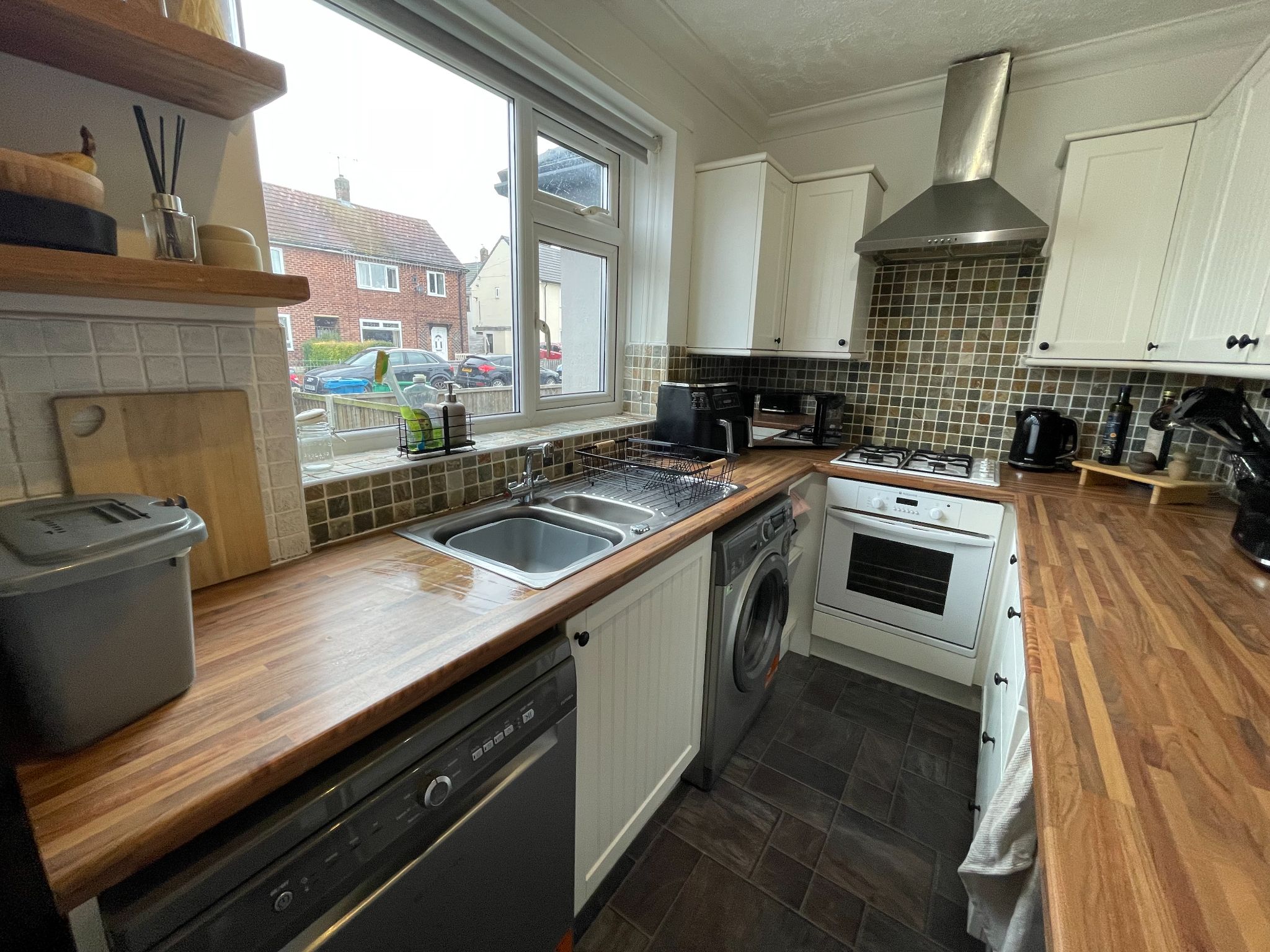 2 bedroom mid terraced house For Sale in Manchester - Photograph 6.