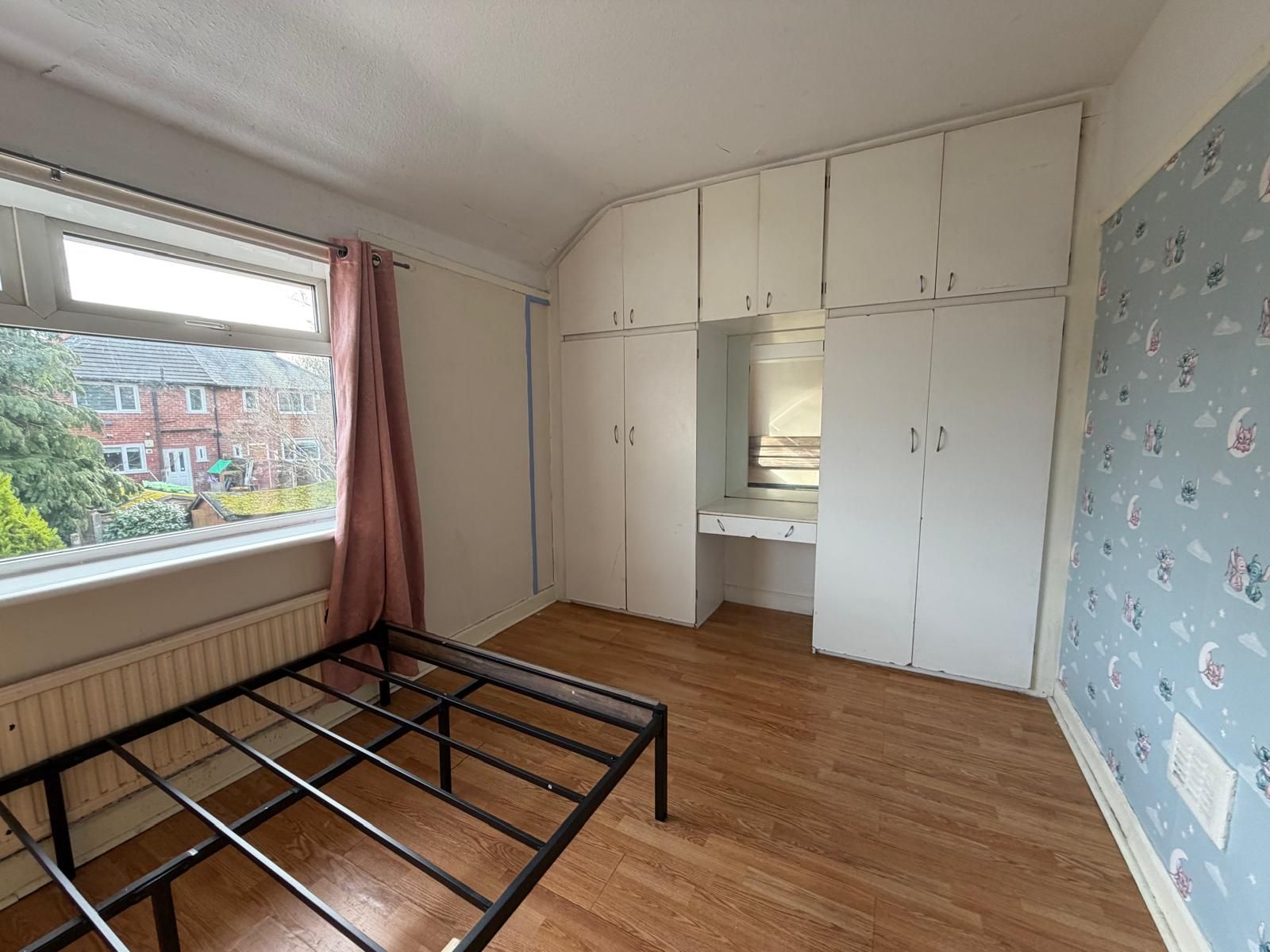 3 bedroom mid terraced house To Let in Manchester - Photograph 5.
