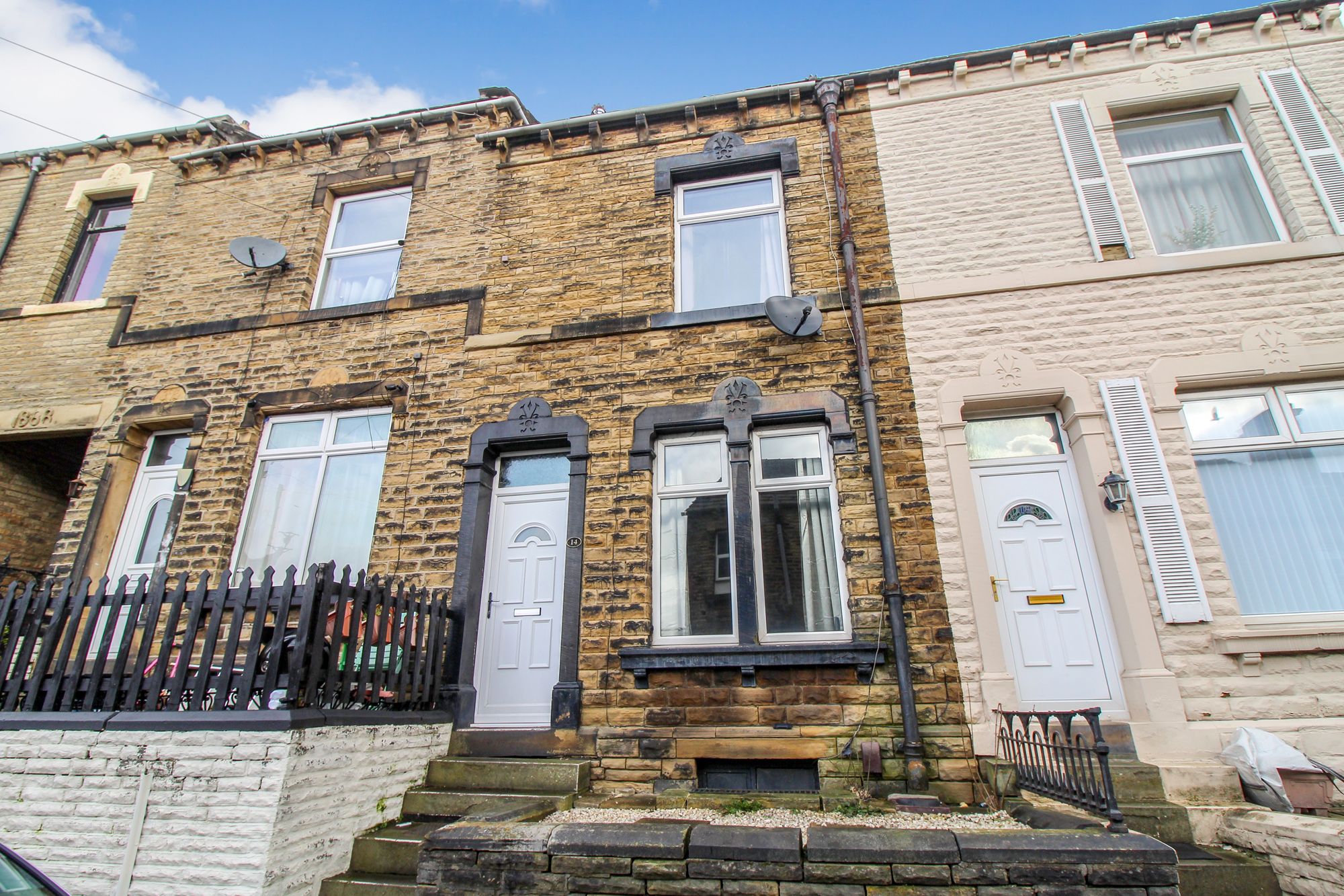 4 bedroom mid terraced house SSTC in Brighouse - Photograph 1