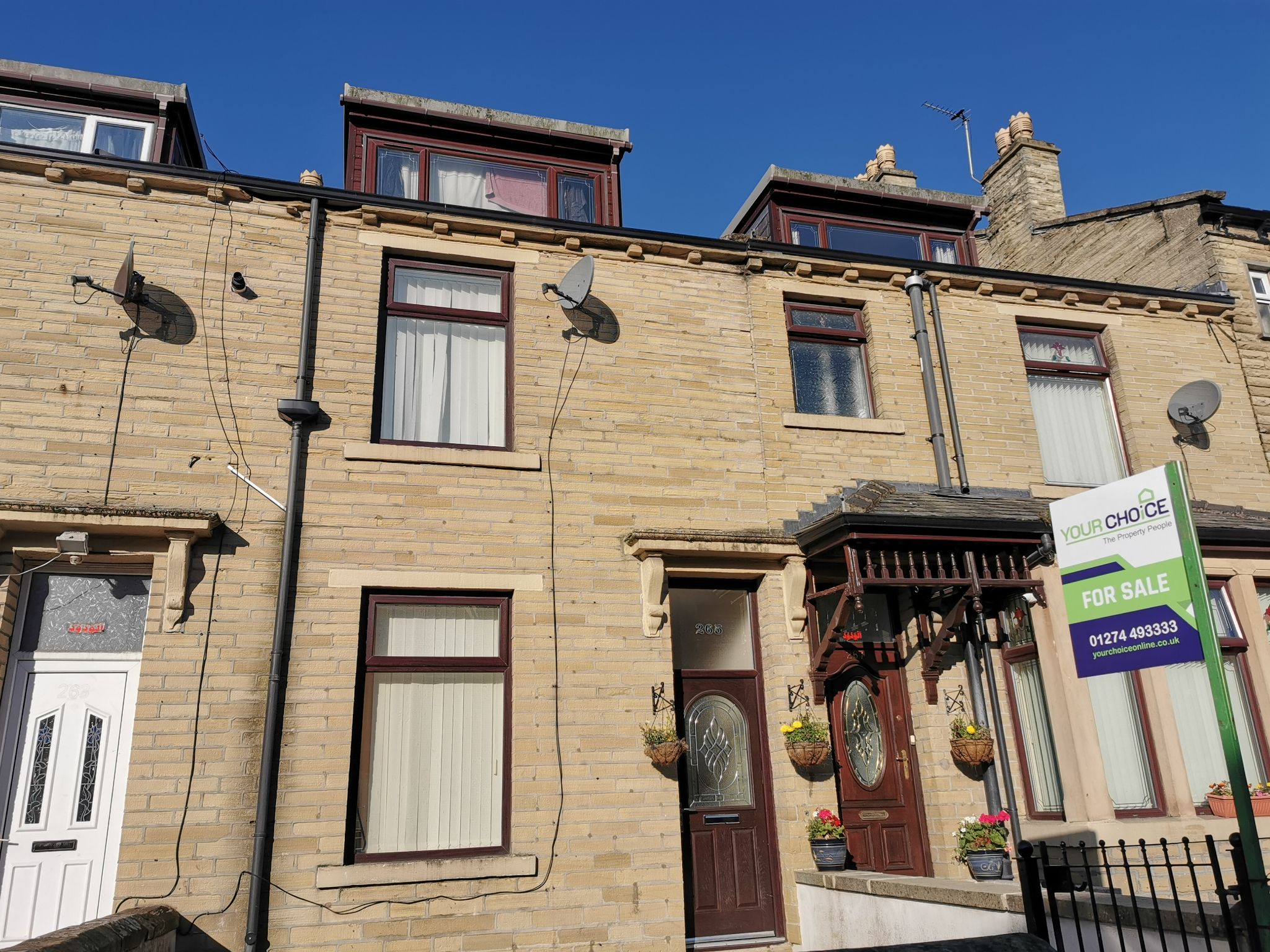 4 bedroom mid terraced house SSTC in Bradford - Photograph 1.