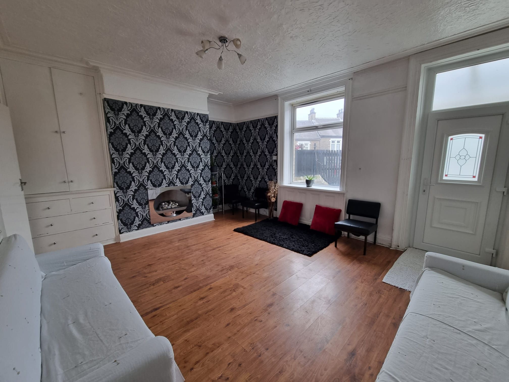 4 bedroom mid terraced house For Sale in Bradford - Sitting Room/Dining Room.