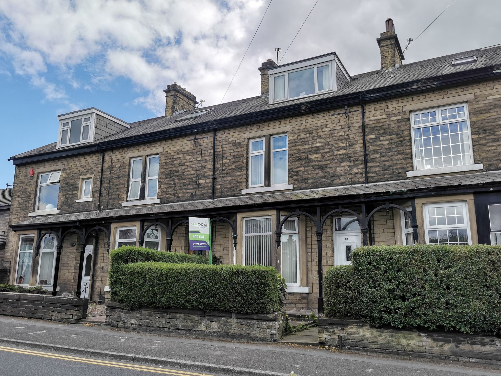 4 bedroom mid terraced house in Bradford - Photograph 1.