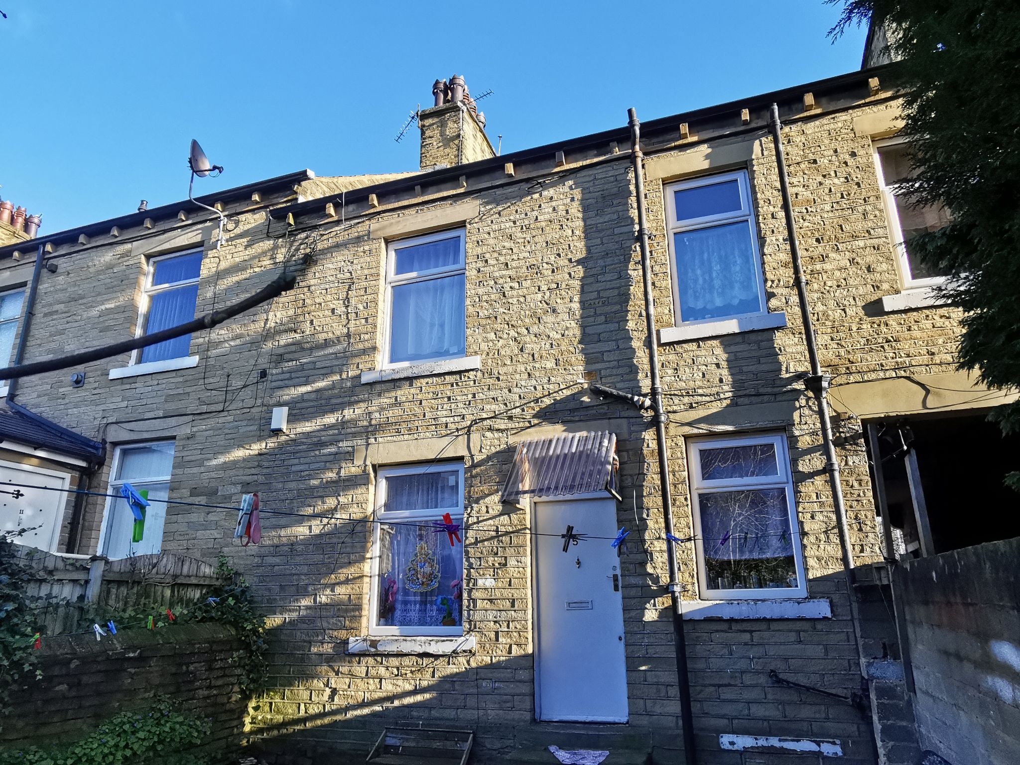 2 bedroom mid terraced house SSTC in Bradford - Photograph 1.