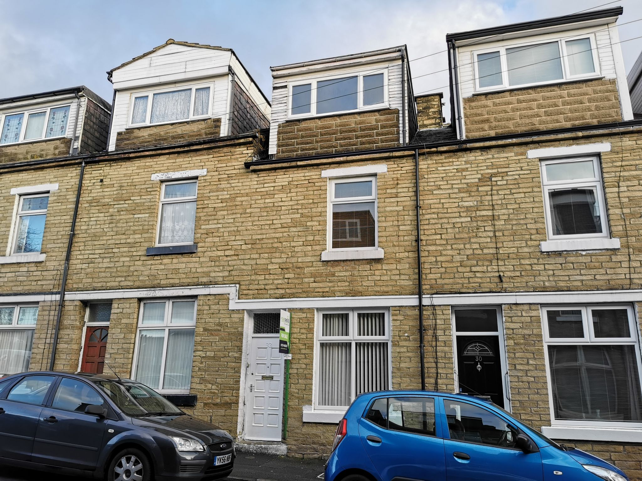 4 bedroom mid terraced house SSTC in Bradford - Photograph 1.