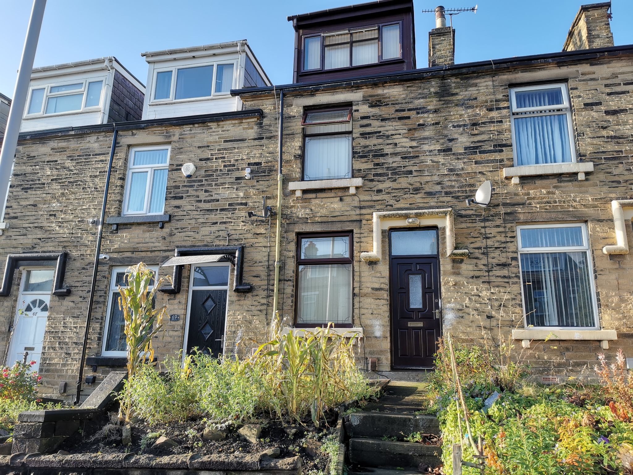 4 bedroom mid terraced house For Sale in Bradford - Photograph 1.