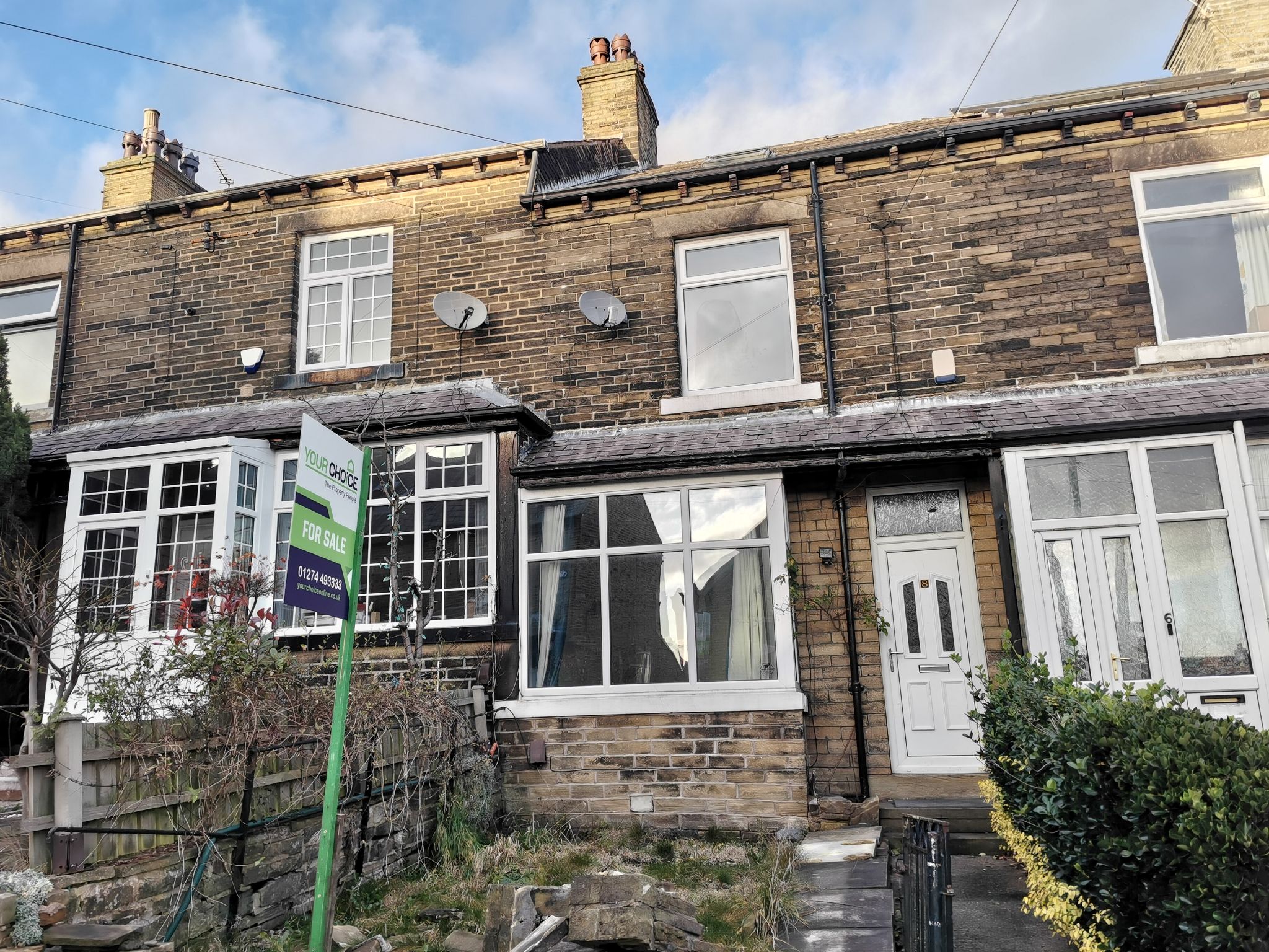 4 bedroom mid terraced house in Bradford - Photograph 1.