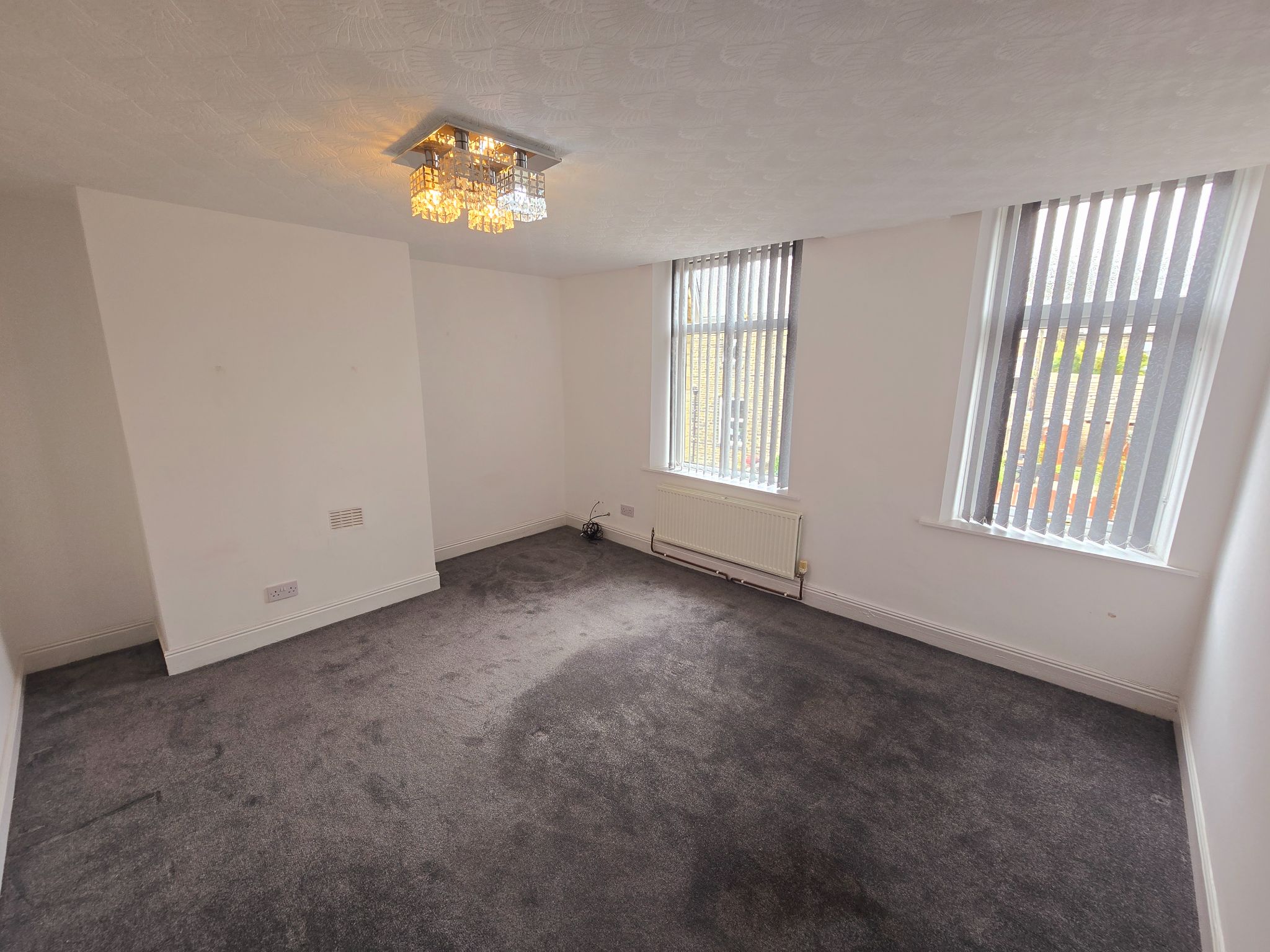 3 bedroom mid terraced house To Let in Bradford - Photograph 6.
