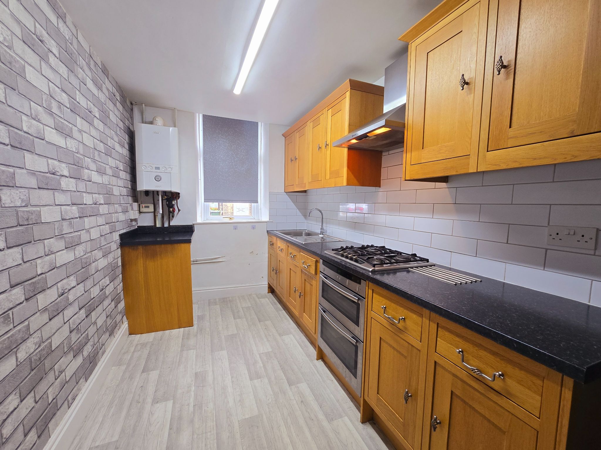 3 bedroom mid terraced house To Let in Bradford - Photograph 4.