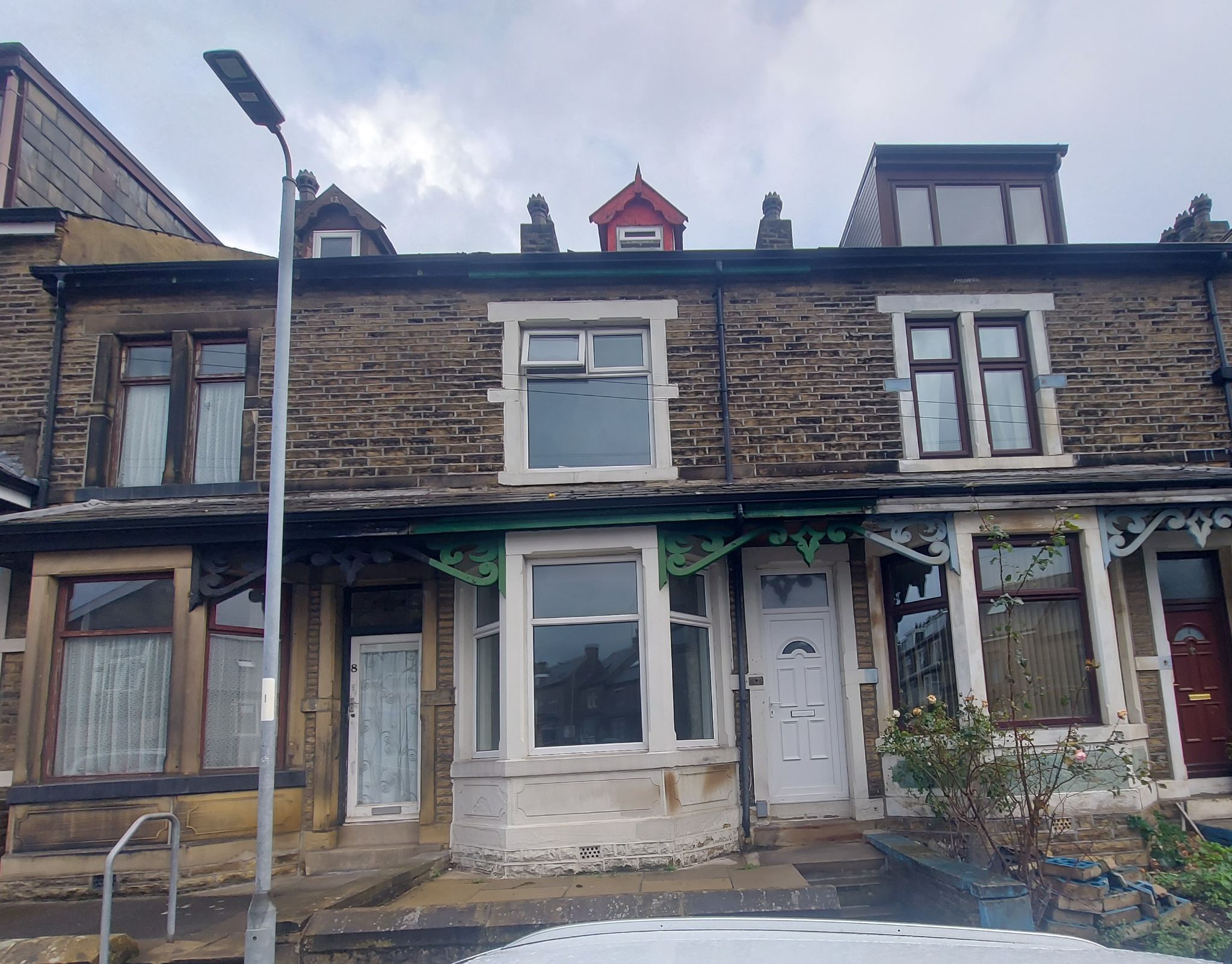 4 bedroom mid terraced house To Let in Bradford - Photograph 1.
