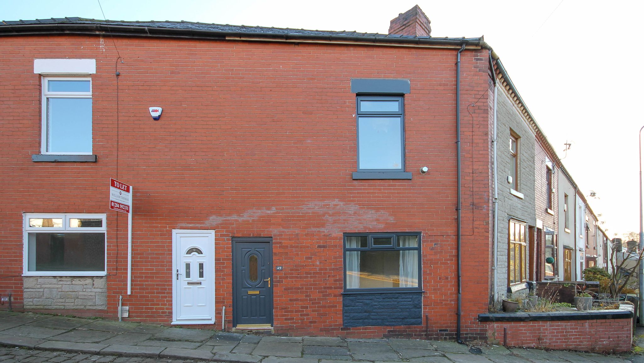 2 bedroom end terraced house For Sale in Bolton - Photograph 1