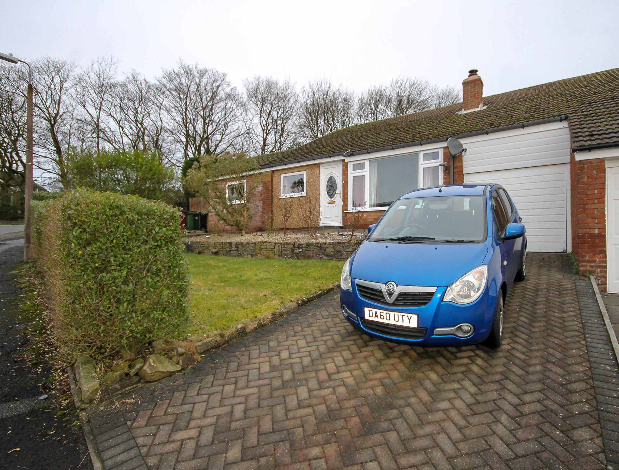 3 bedroom link detached bungalow For Sale in Bolton - Photograph 1