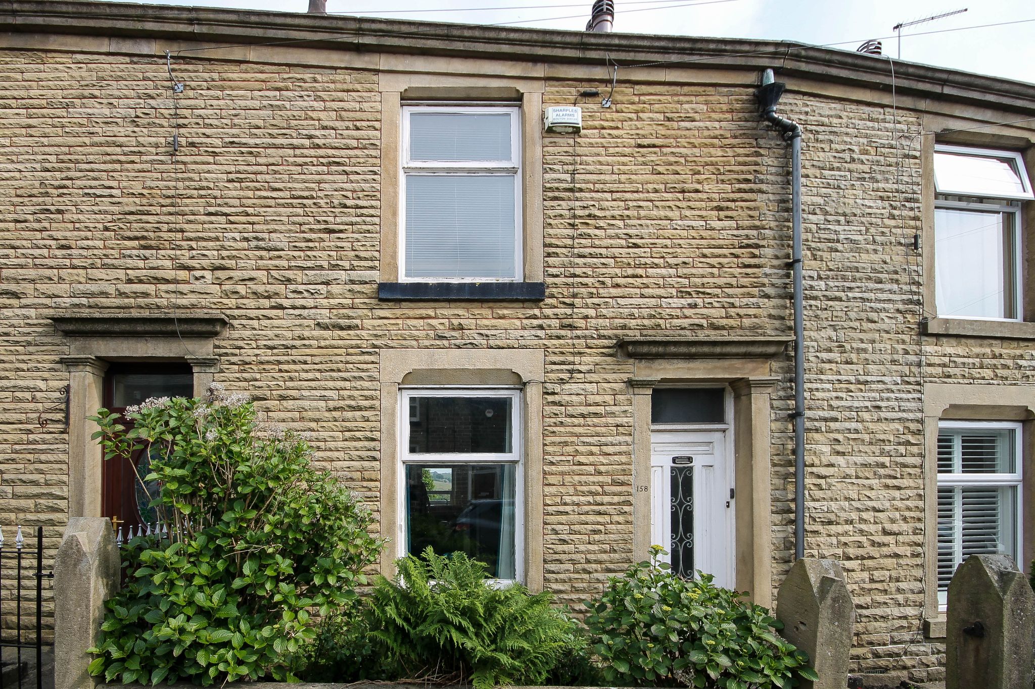 2 bedroom mid terraced house For Sale in Bolton - Photograph 1