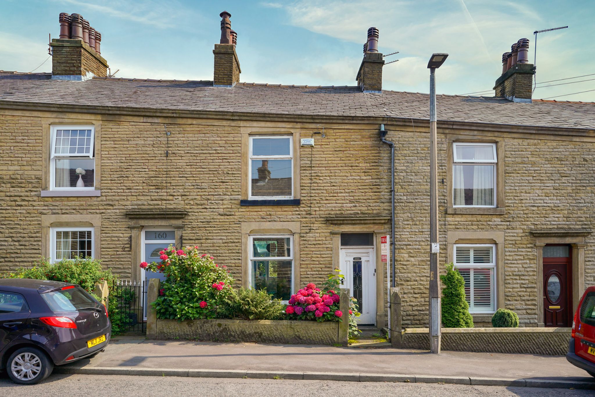 2 bedroom mid terraced house For Sale in Bolton - Photograph 1