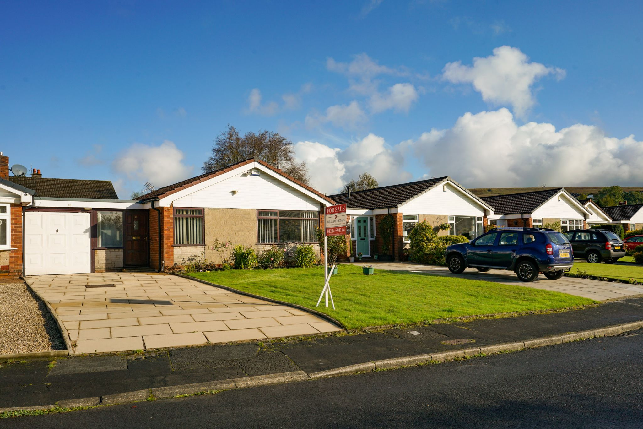 2 bedroom link detached bungalow SSTC in Bolton - Photograph 1