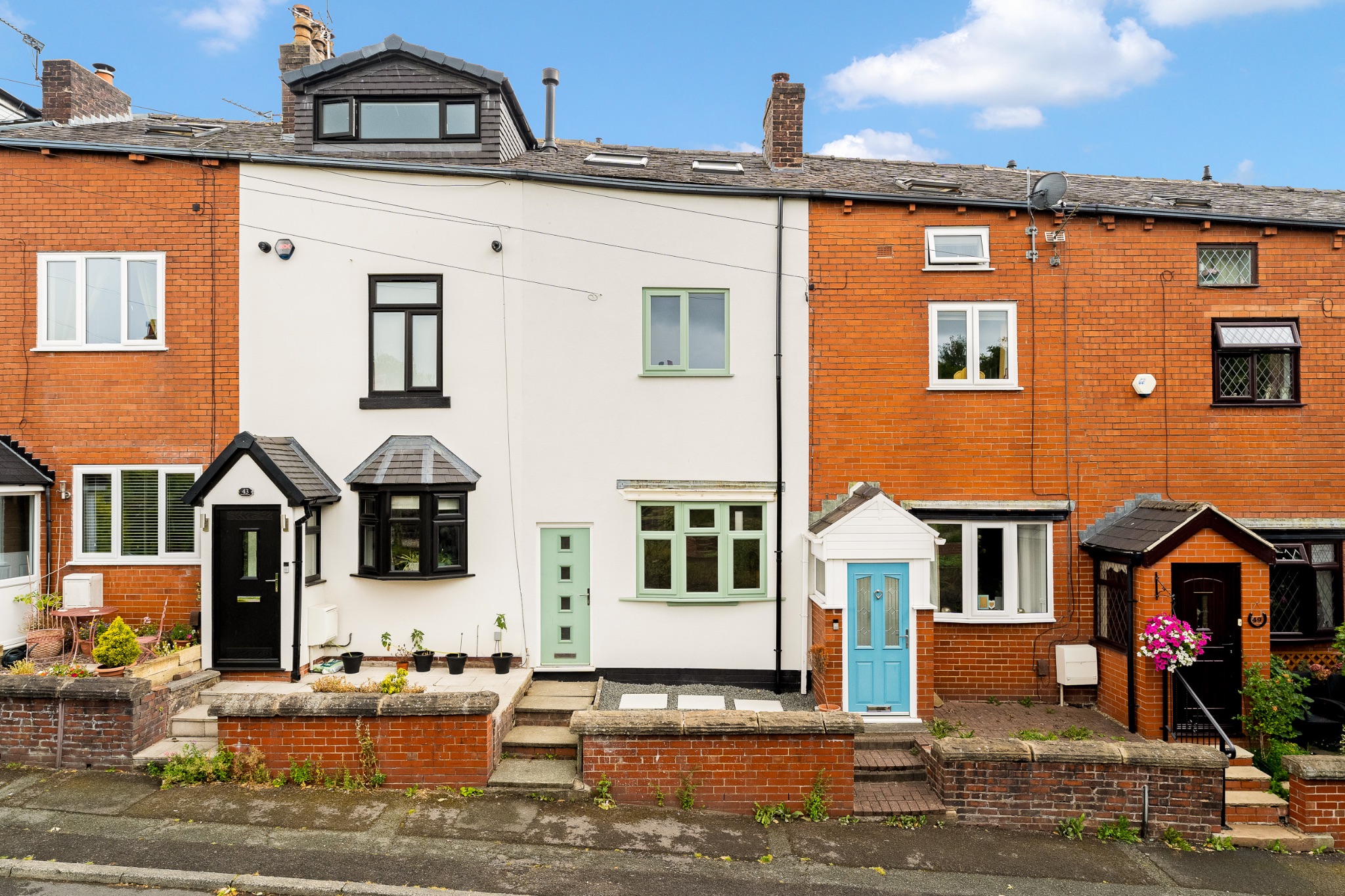 3 bedroom mid terraced house For Sale in Bolton - Photograph 1.