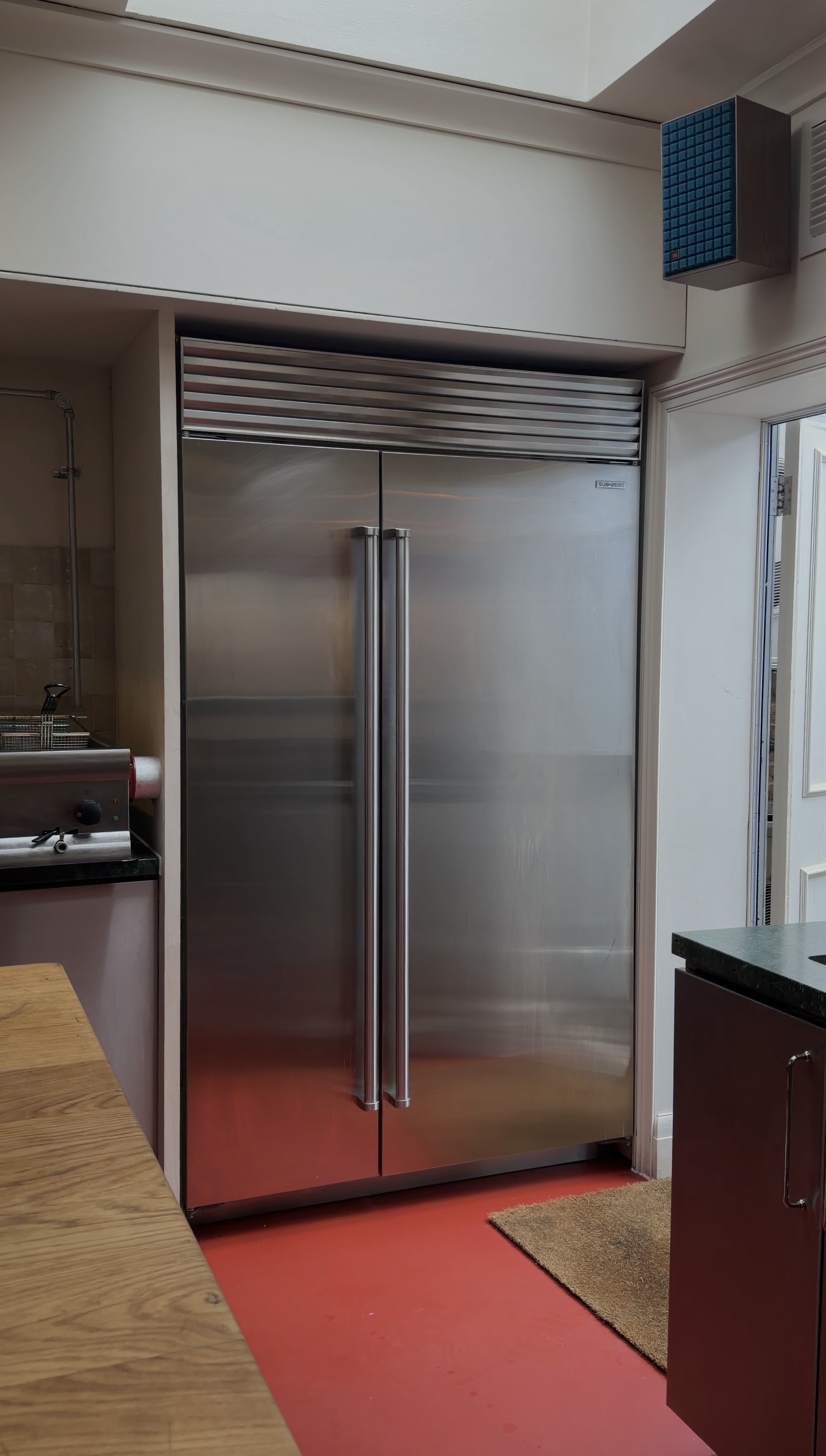 Sub-Zero refrigeration and Wolf range cooker in the kitchen