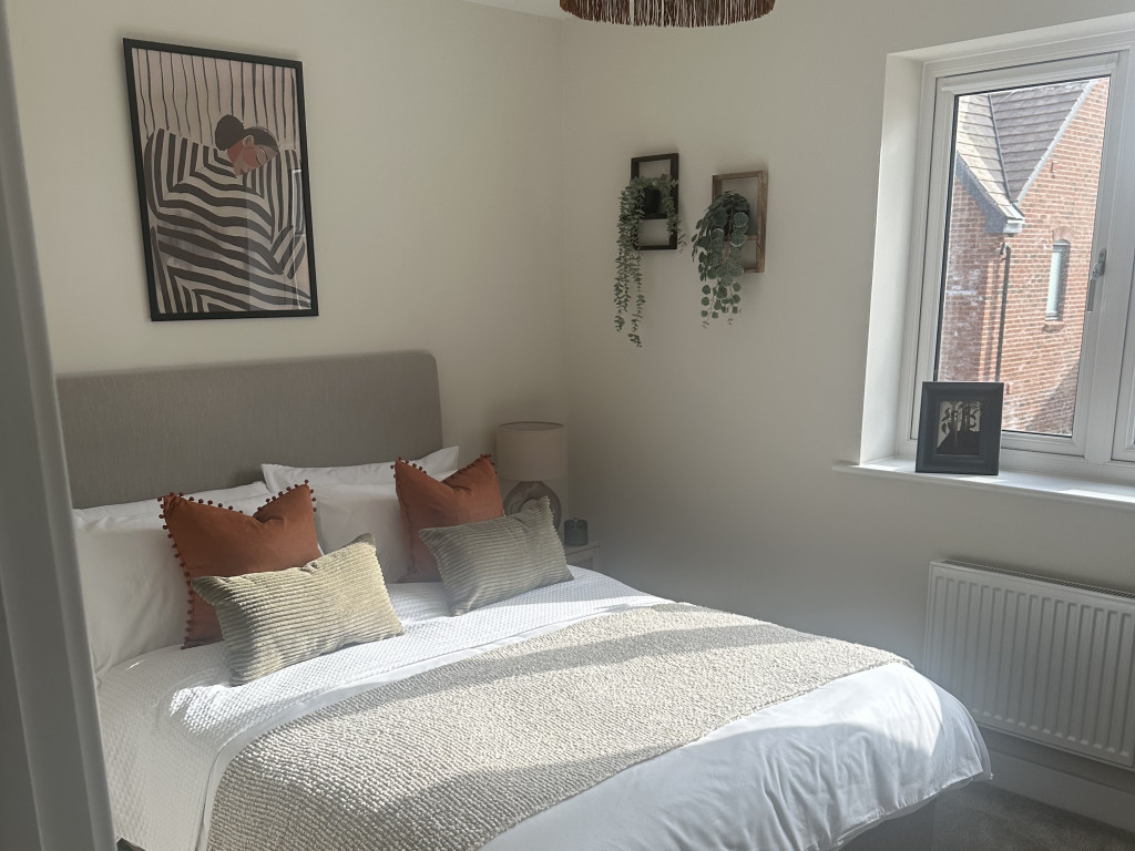 Stylish staged bedroom in Surrey - designed to attract buyers