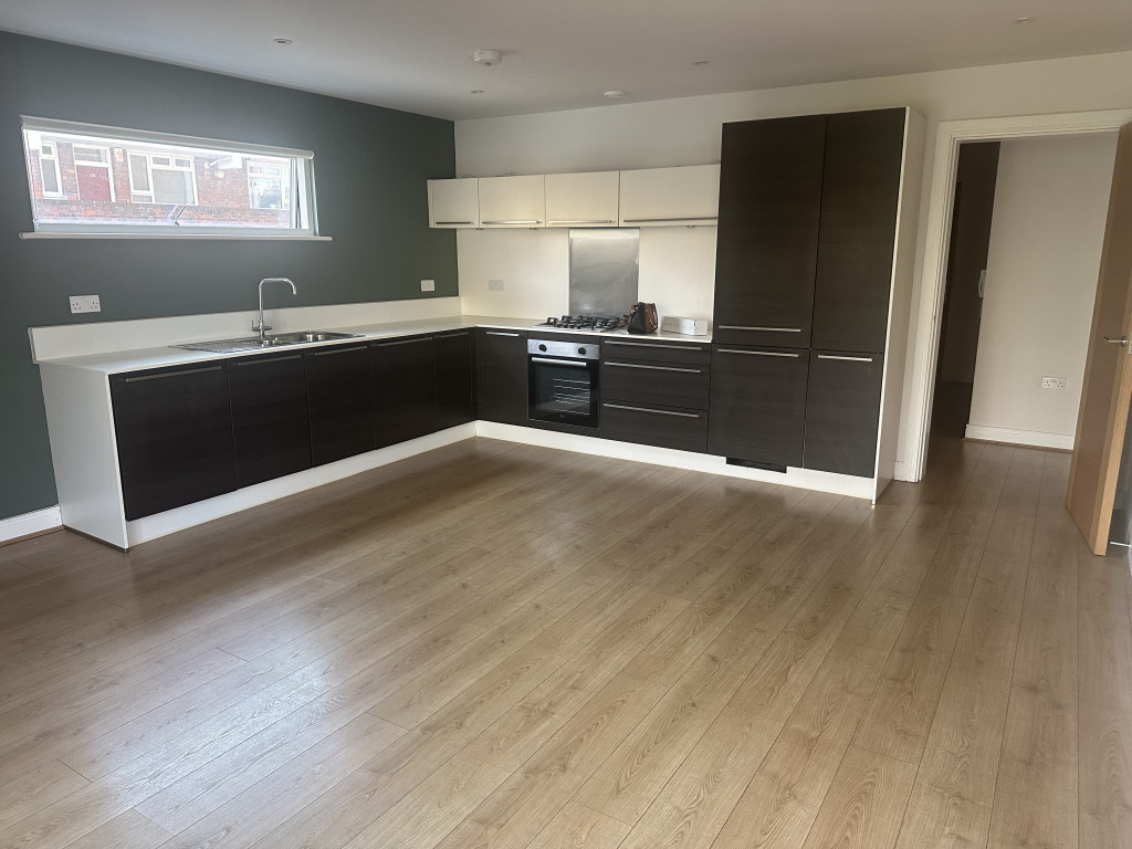 Before home staging image – empty open plan living and dining room ready for transformation