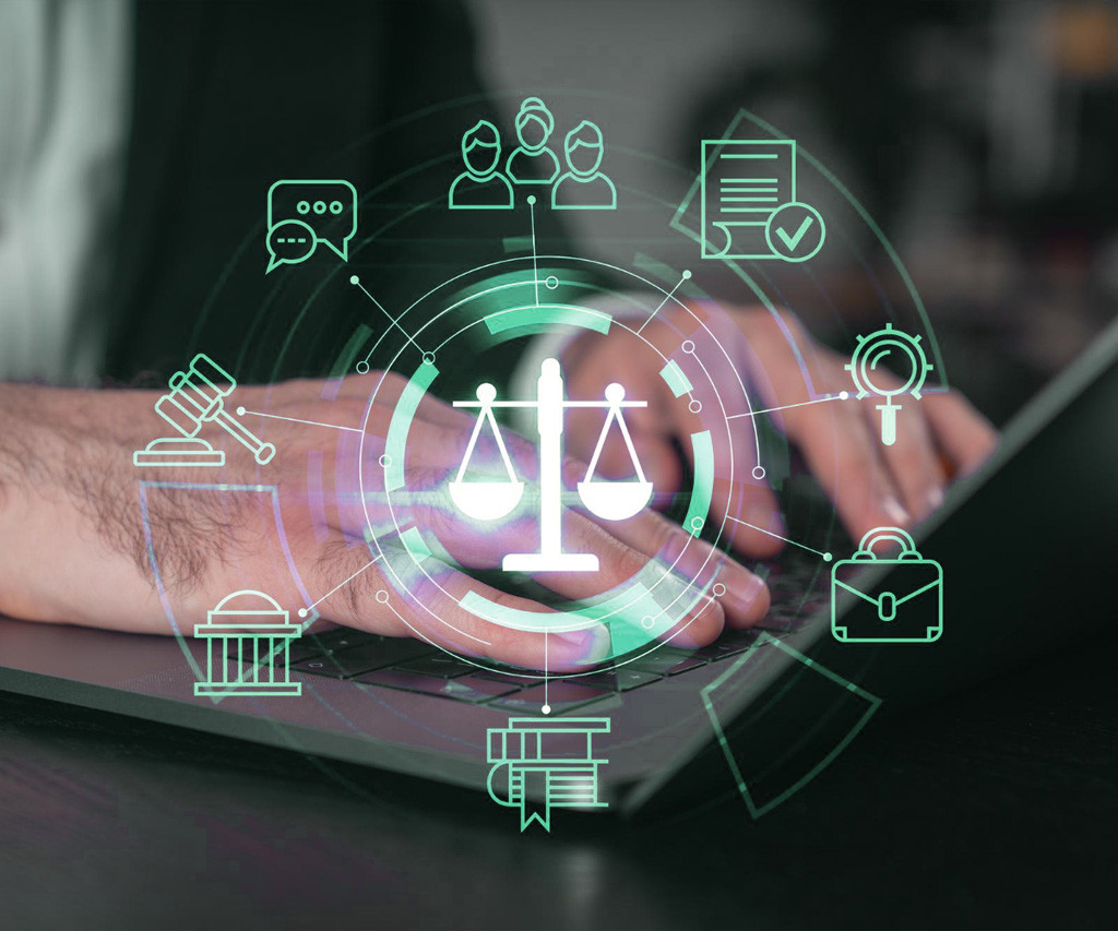 Person typing on laptop with digital icons of justice scales, legal documents and gavel overlay | Amodaia