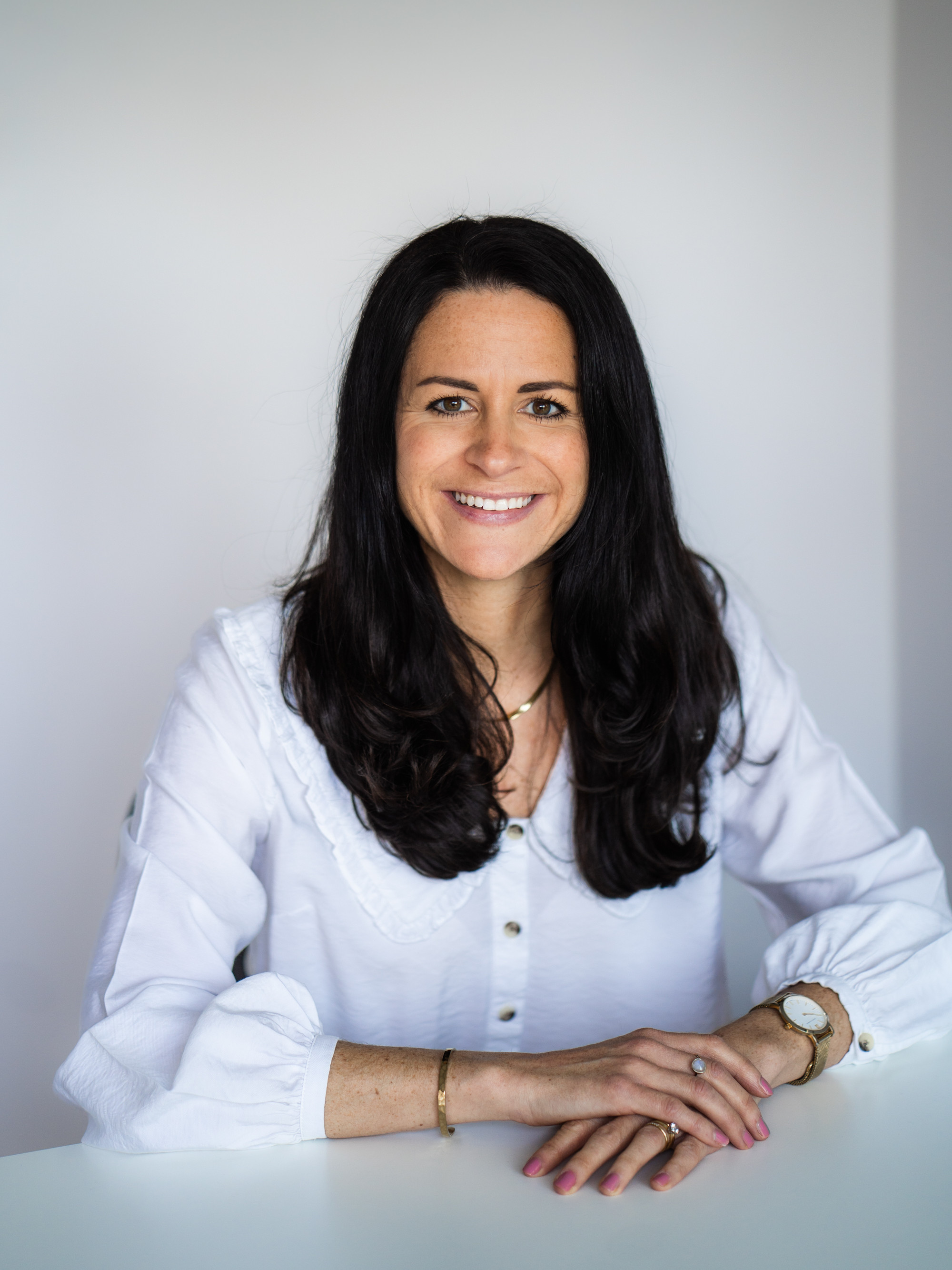 White blouse headshot.jpg