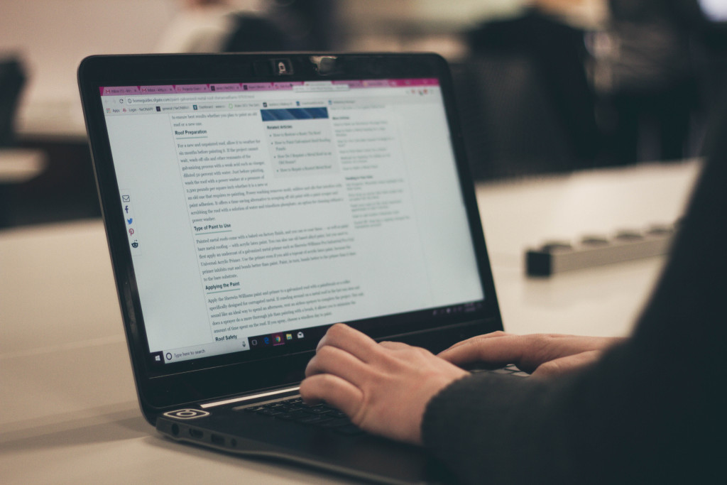 Person blogging on a laptop - Clickmo - SEO & PPC Agency Person blogging on a laptop - Clickmo - SEO & PPC Agency