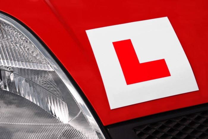 l-plate-on-red-car.jpg l-plate-on-red-car.jpg