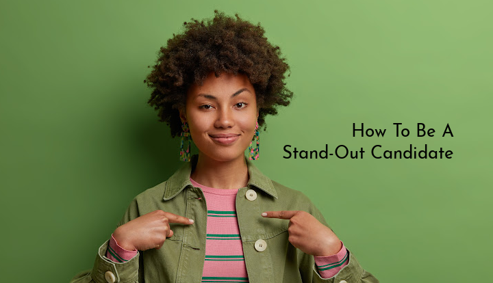 stand out candidate.png girl pointing towards herself looking happy