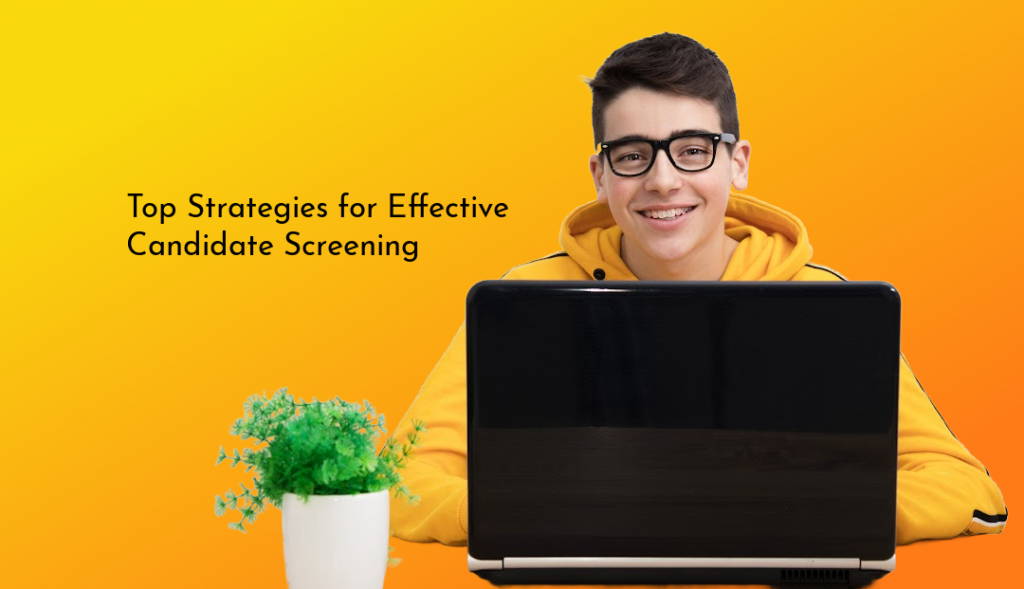 screening.png man smiling over the top of laptop