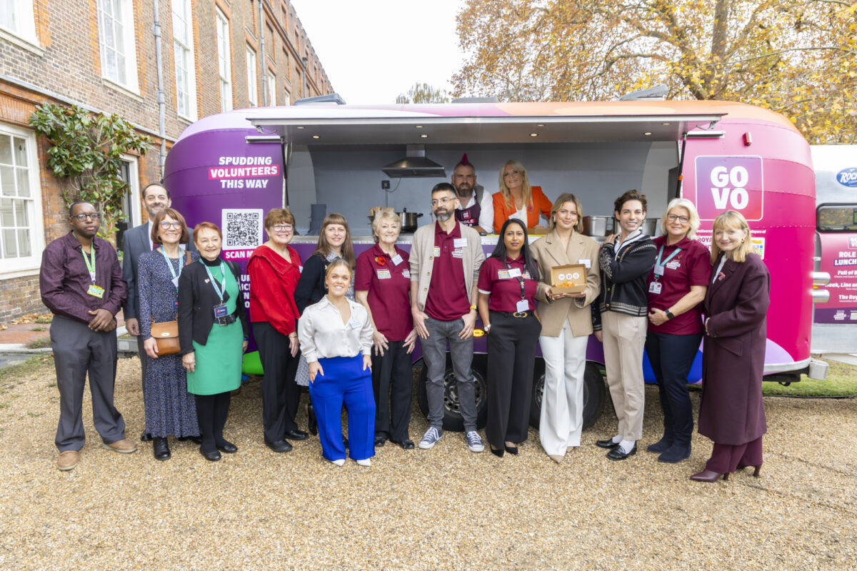 Volunteers standing in front of a food van at the RVS event.