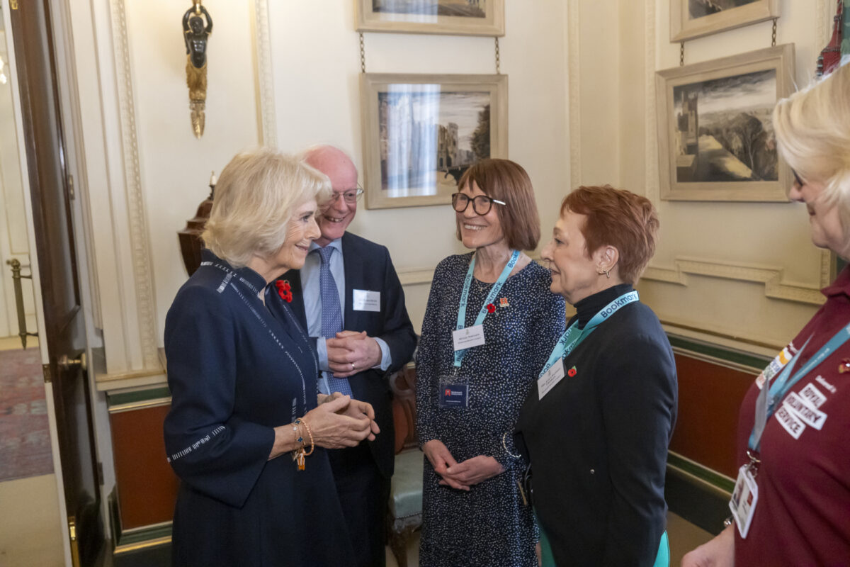 Queen Camila and Bookmark volunteers meeting at Clarence House at the RVS event.